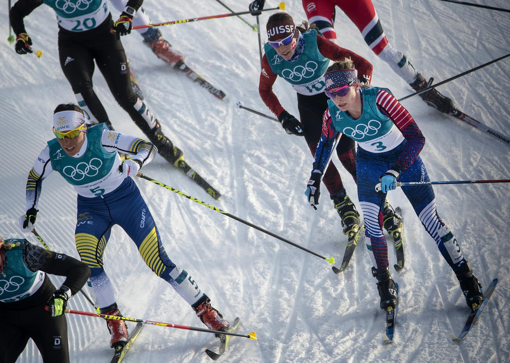 Jessie Diggins (3) from Afton, Minnesota during the women's 7.5km + 7.5km Skiathlon at Alpensia Cross-Country Skiing Centre. Diggins placed fifth in the women's cross-country skiathlon event. Diggins was 10th at the halfway transition, 5.4 seconds off the pace. She was able to take 3.3 seconds off that lead by the halfway point of the second leg, but a grueling pace set by Sweden's Charlotte Kalla over the last three kilometers left the field fighting for silver. ] CARLOS GONZALEZ • cgonz
