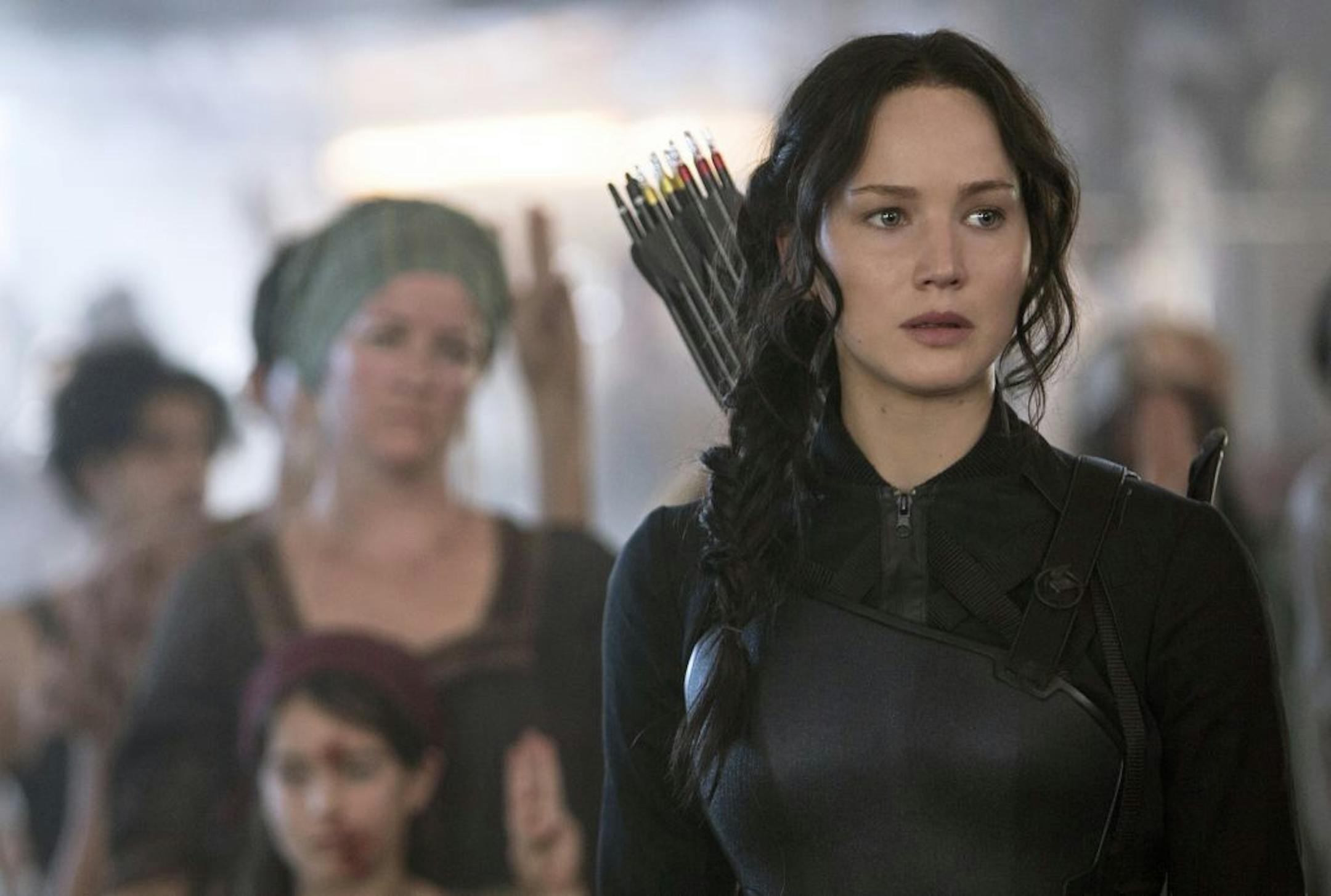 In this image released by Lionsgate, Jennifer Lawrence portrays Katniss Everdeen in a scene from "The Hunger Games: Mockingjay Part 1."
