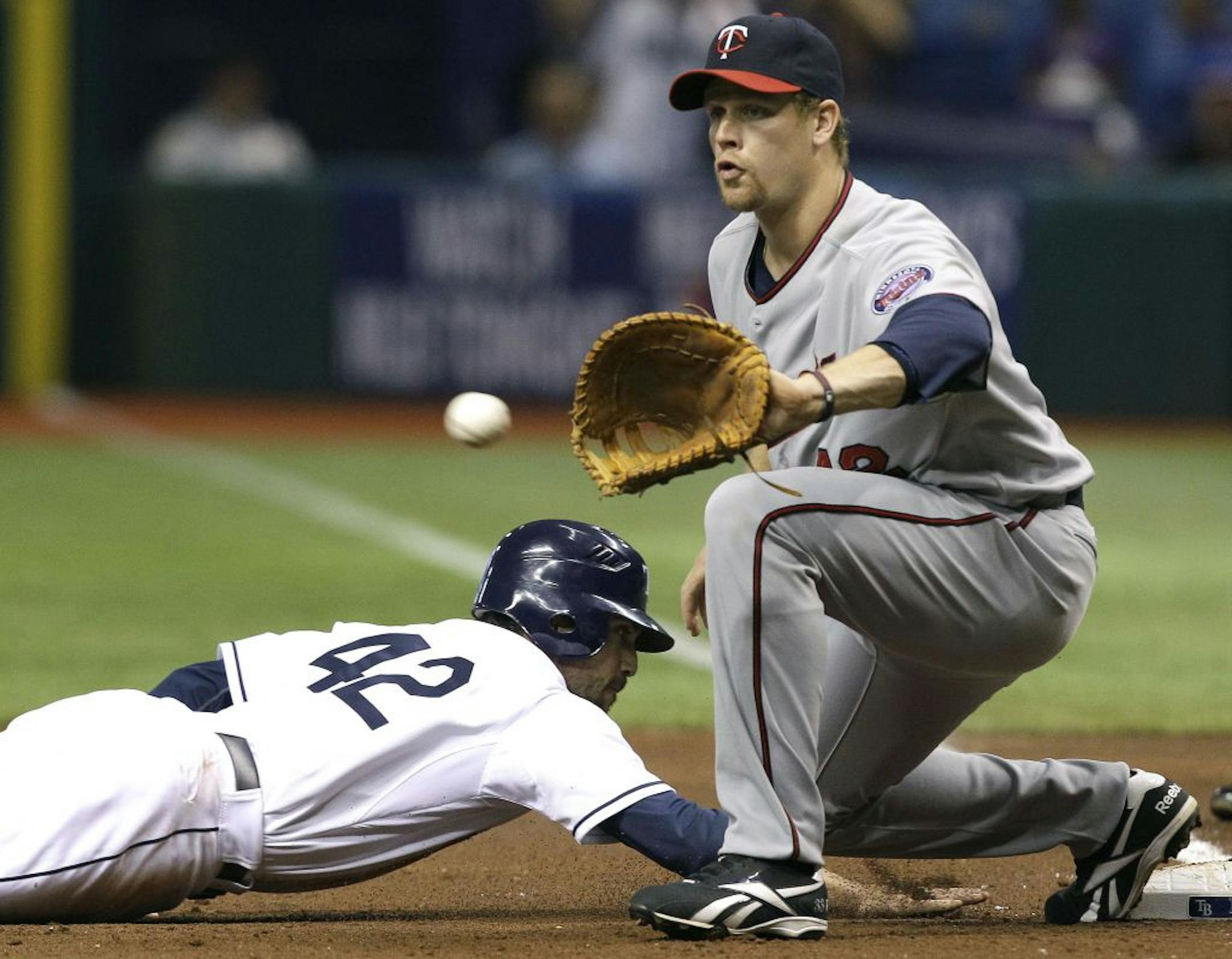 Twins first baseman Justin Morneau (right)