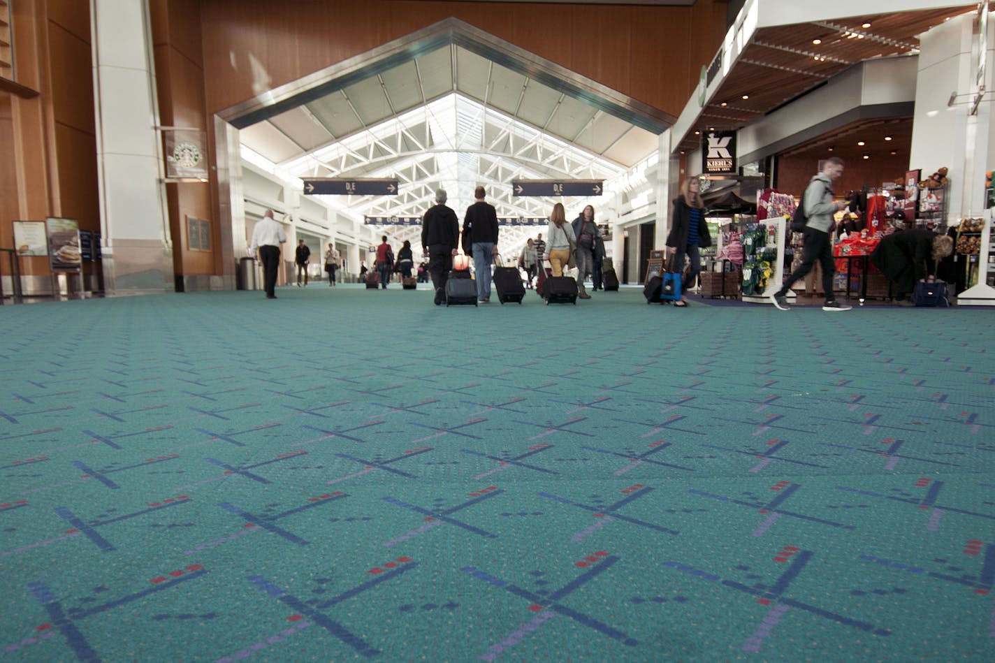 PORTLAND -- The Portland Airport's iconic carpet, which was removed two years ago. It was designed by a team of architects who were "inspired by the radar patterns seen in the control tower screens of the runways and planes landing."