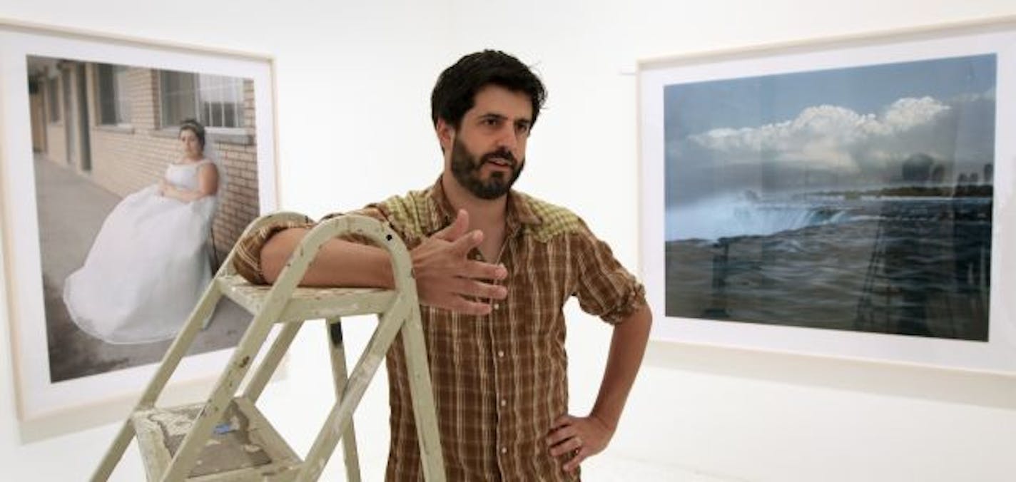 (left to right) Photographer Alec Soth talked about his work during the hanging of Soth's show at the Walker Art Center.