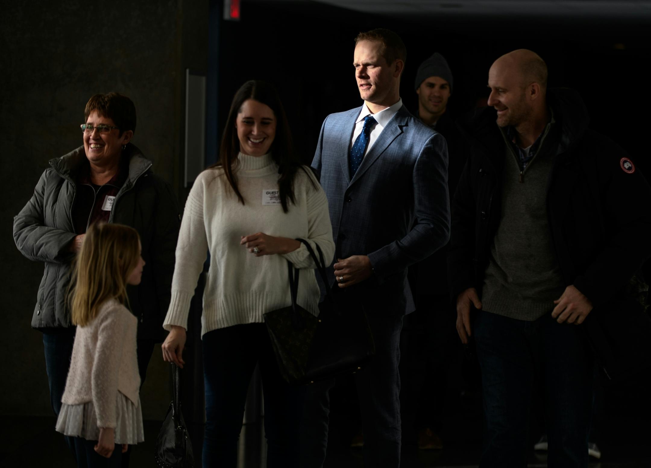 Former Twins first baseman Justin Morneau, center, arrived with friends and family to Morneau's retirement press conference Wednesday afternoon at Target Field.
