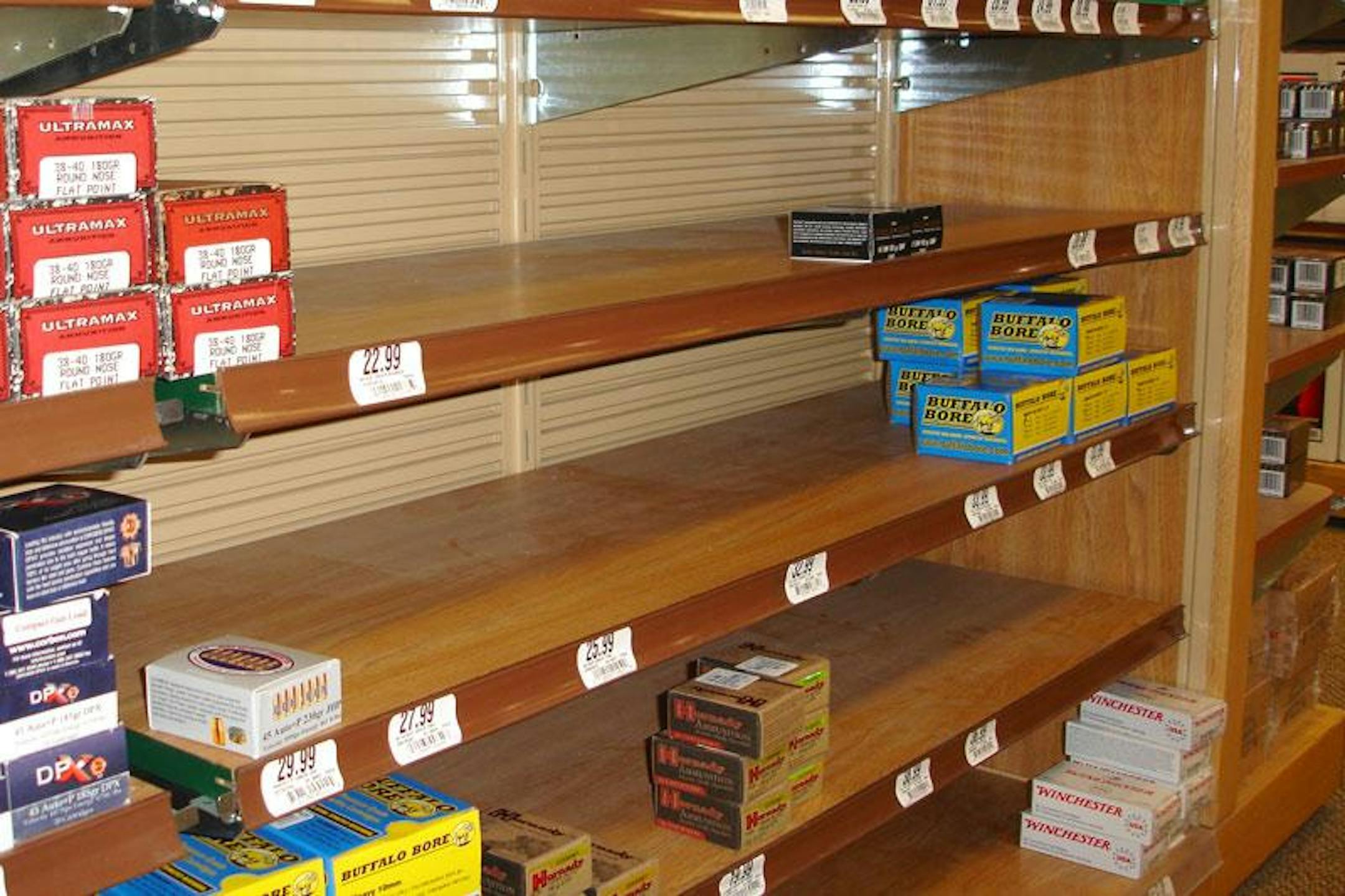 Empty space found on store shelves has forced retailers to substitute ammunition with other gun accessories.