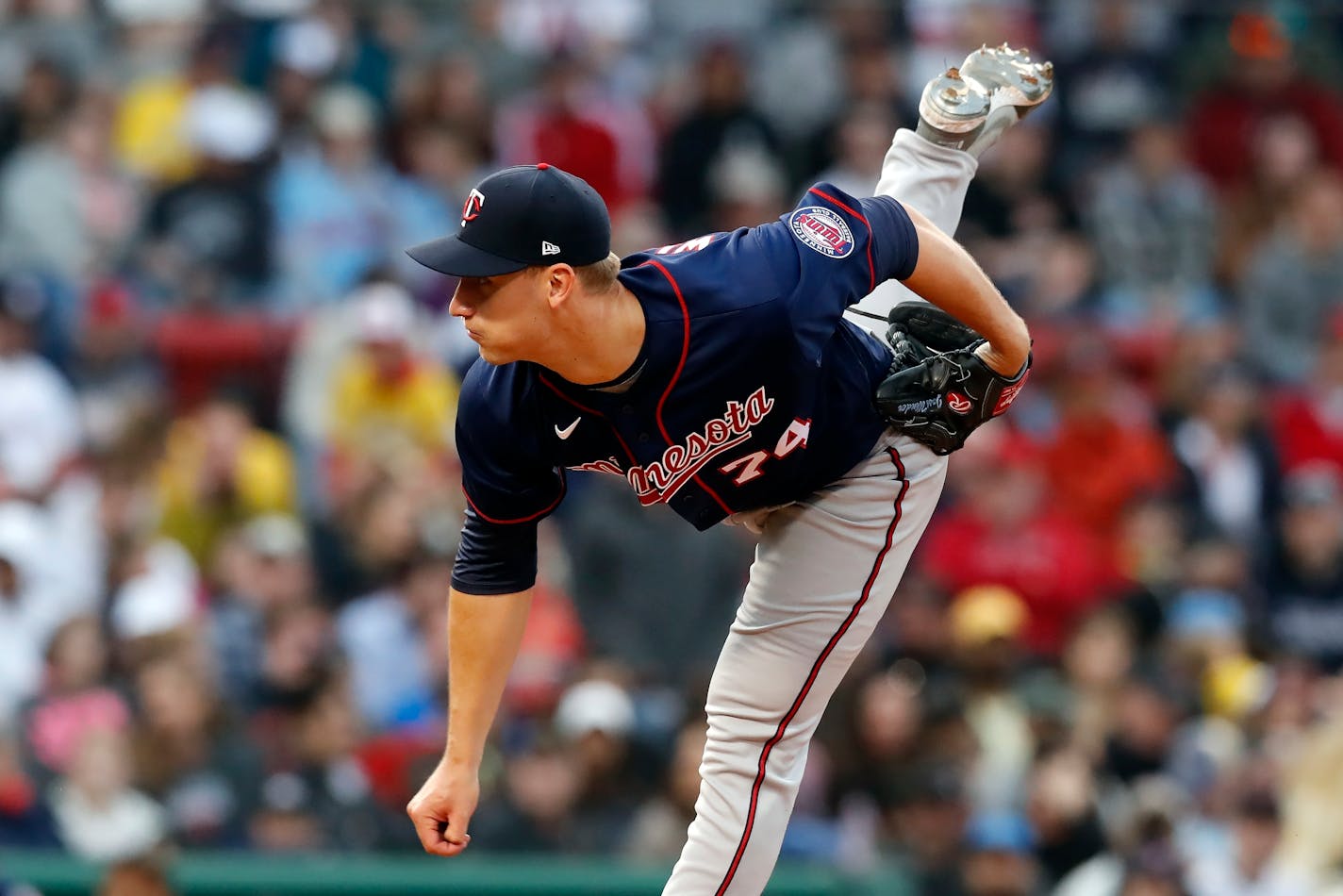 Minnesota Twins' Josh Winder pitches during the seventh inning of a baseball game against the Boston Red Sox, Saturday, April 16, 2022, in Boston. (AP Photo/Michael Dwyer)