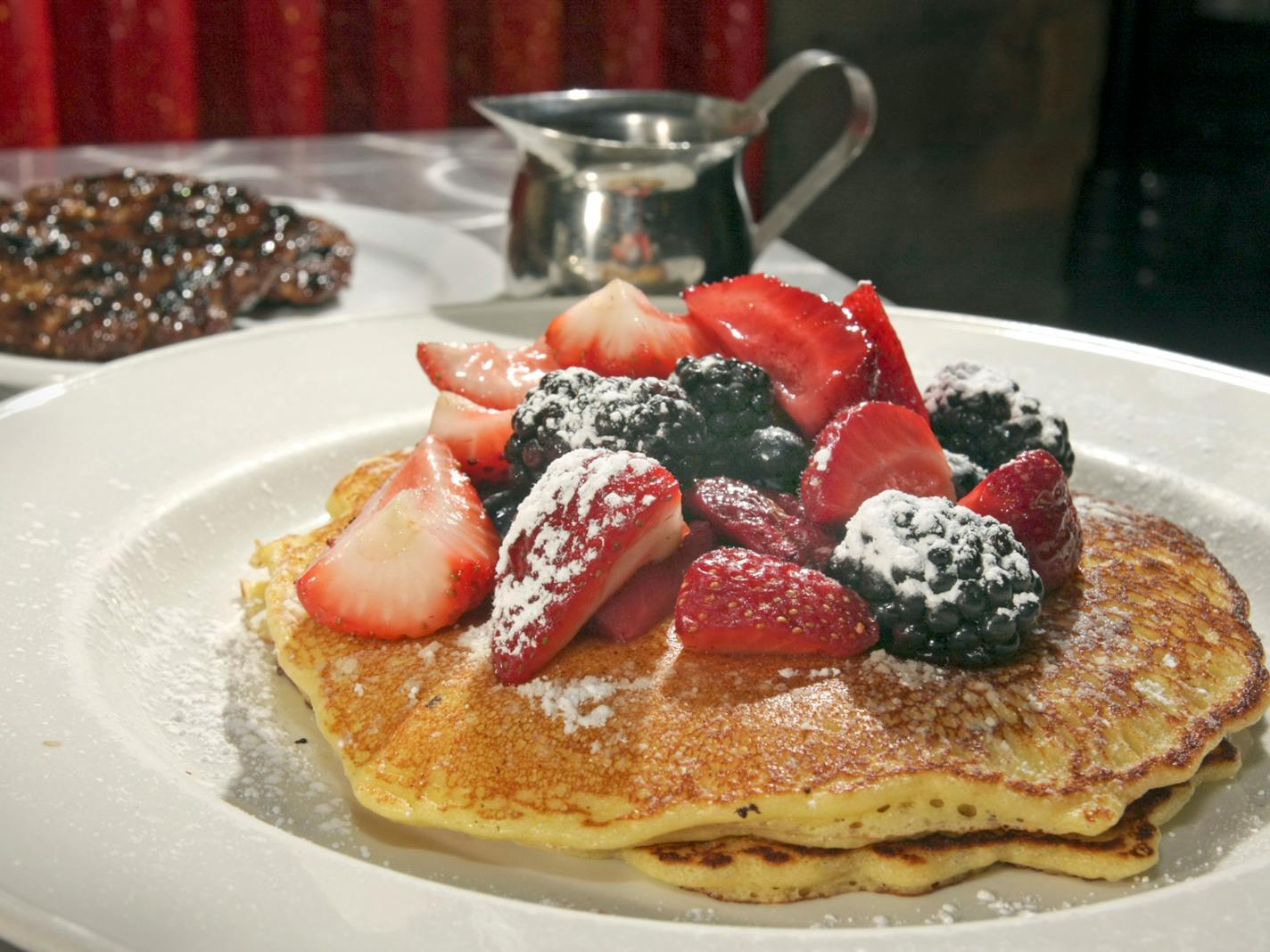 TOM SWEENEY ï tsweeney@startribune.com Mpls, MN 4/10/2008 ] Vita.MN breakfast pics,- Hell's Kitchen, 10th St downtown Mpls, : lemon ricotta pancakes with bison sausage