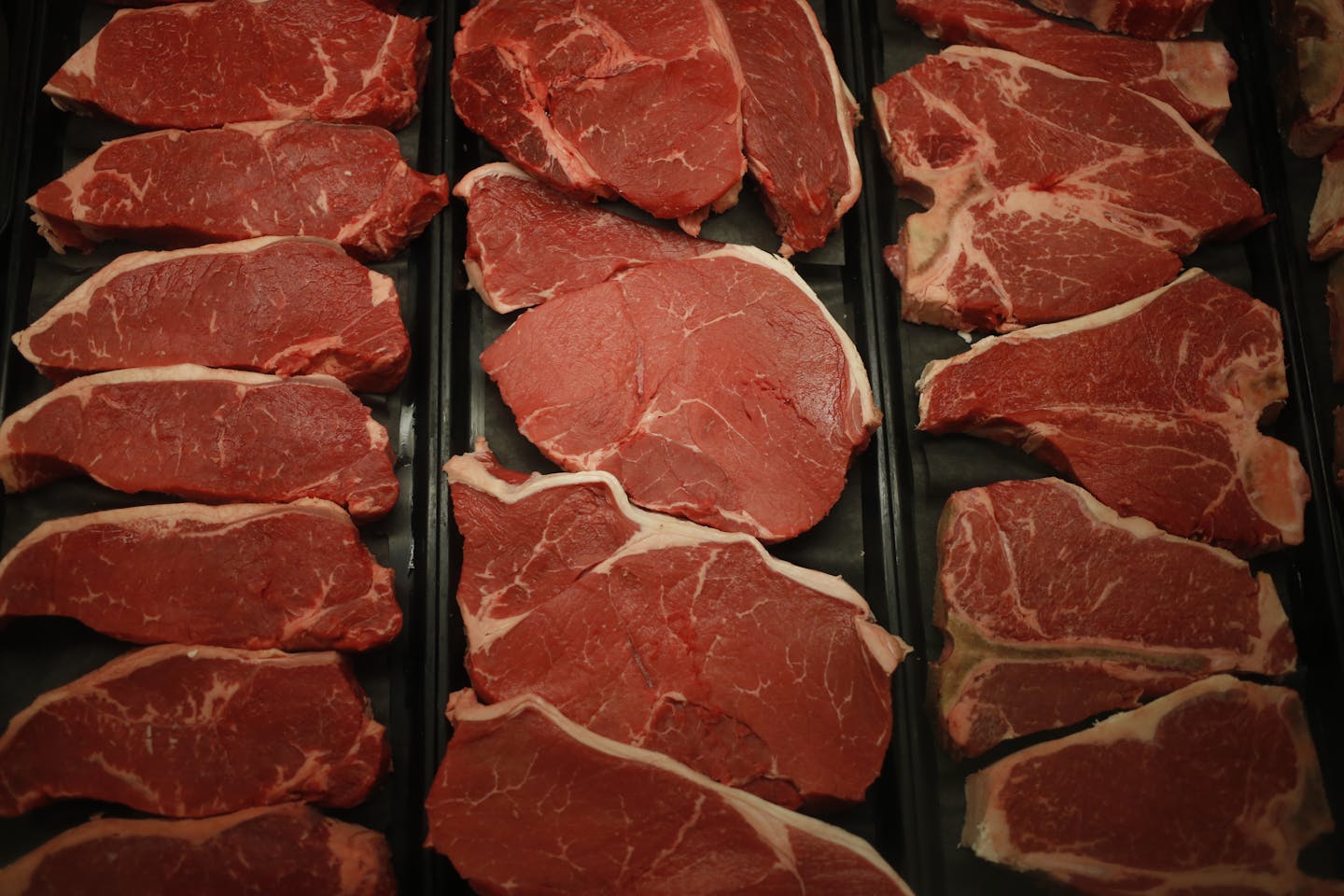 Beef sirloin steaks are displayed behind the meat counter a grocery store in Knoxville, Tennessee, in this 2014 photo. MUST CREDIT: Bloomberg photo by Luke Sharrett.