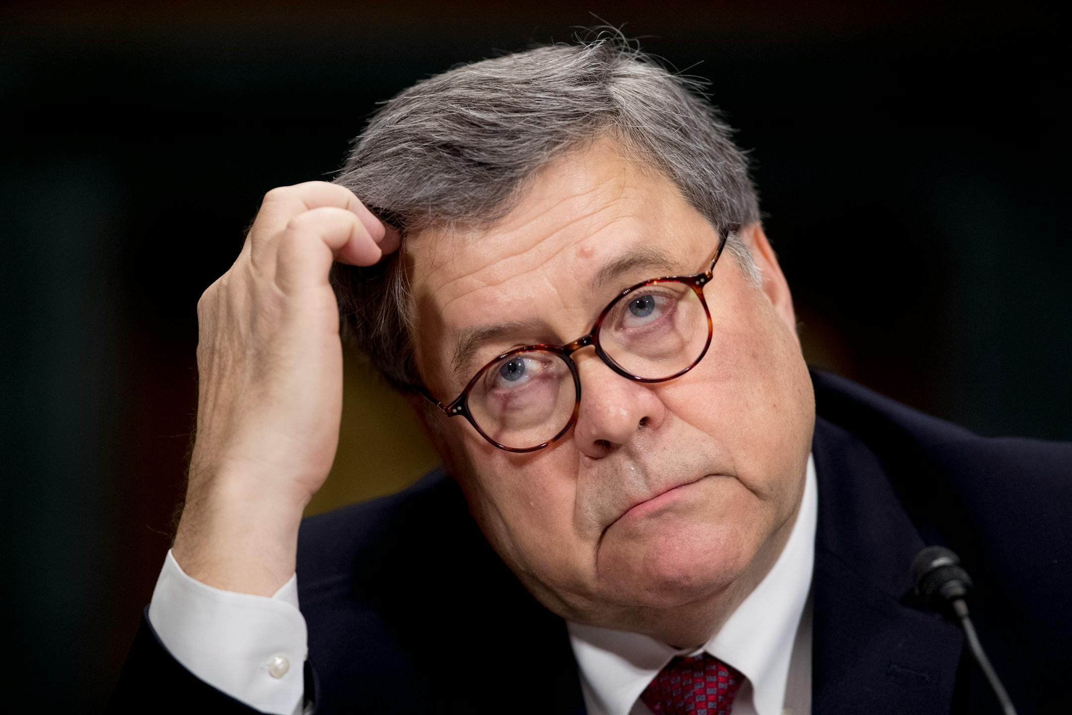 FILE- Attorney General William Barr appears at a Senate Judiciary Committee hearing on Capitol Hill in Washington. The Justice Department says it is willing to provide the House intelligence committee with documents from special counsel Robert Mueller's investigation, as long as the panel agrees not to take any action against Barr.