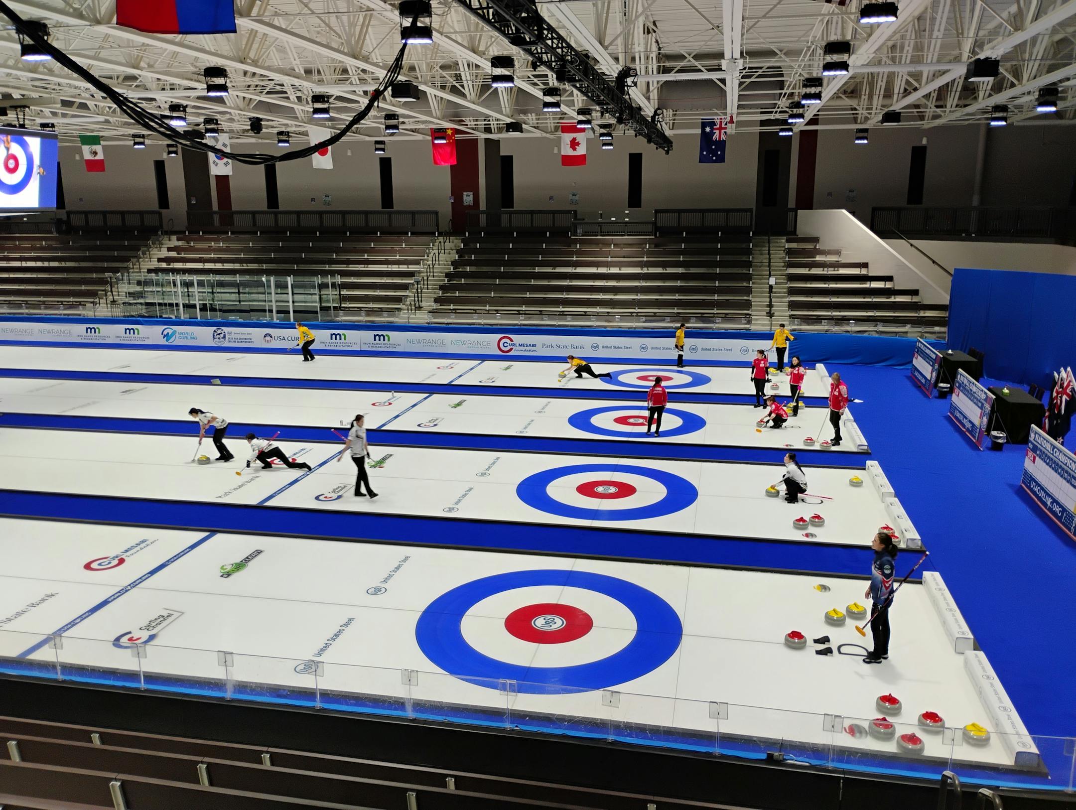 Curlers hone their craft during a women's team practice session on Oct. 20 at the Pan Continental Curling Championships at the Iron Trail Motors Event Center in Virginia, Minn. The tournament ended Sunday with China winning the women's gold medal and Canada winning the men's gold medal.