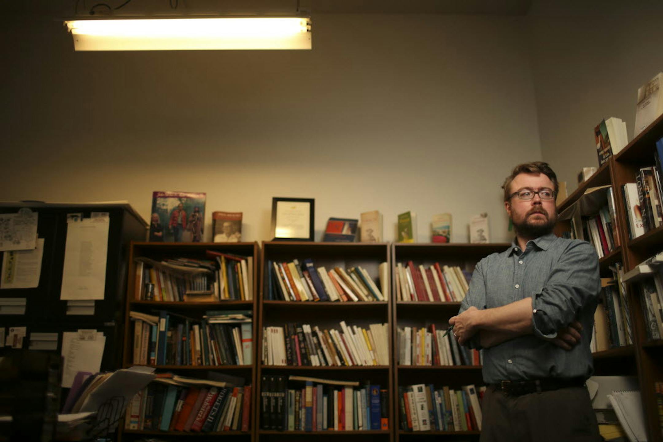 Chris Fischbach in his office at Coffee House Press.