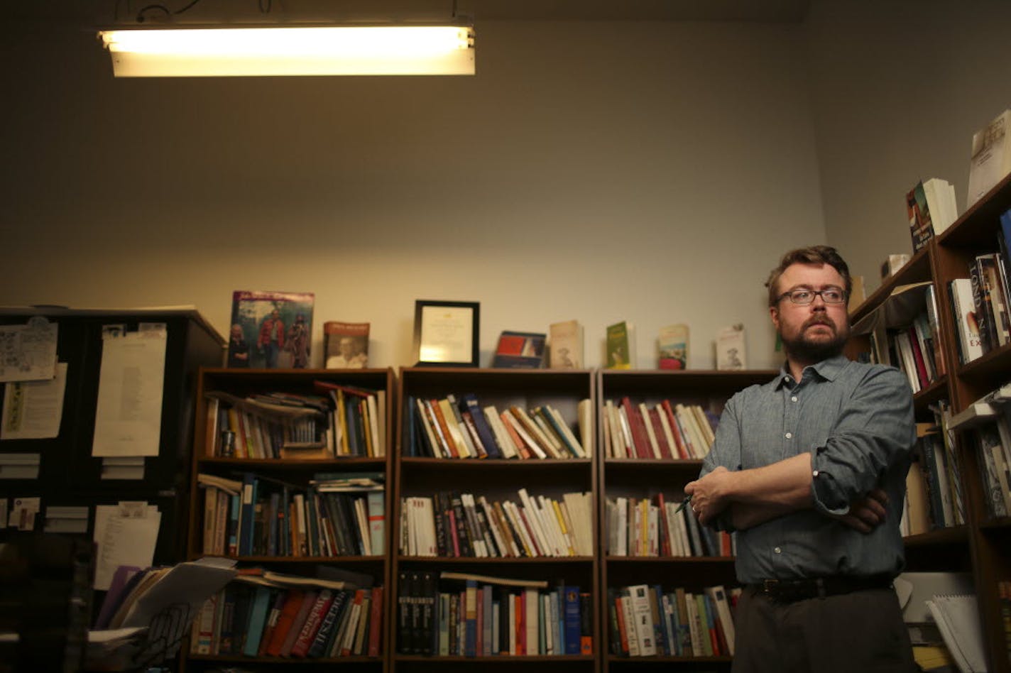 Chris Fischbach in his office at Coffee House Press.