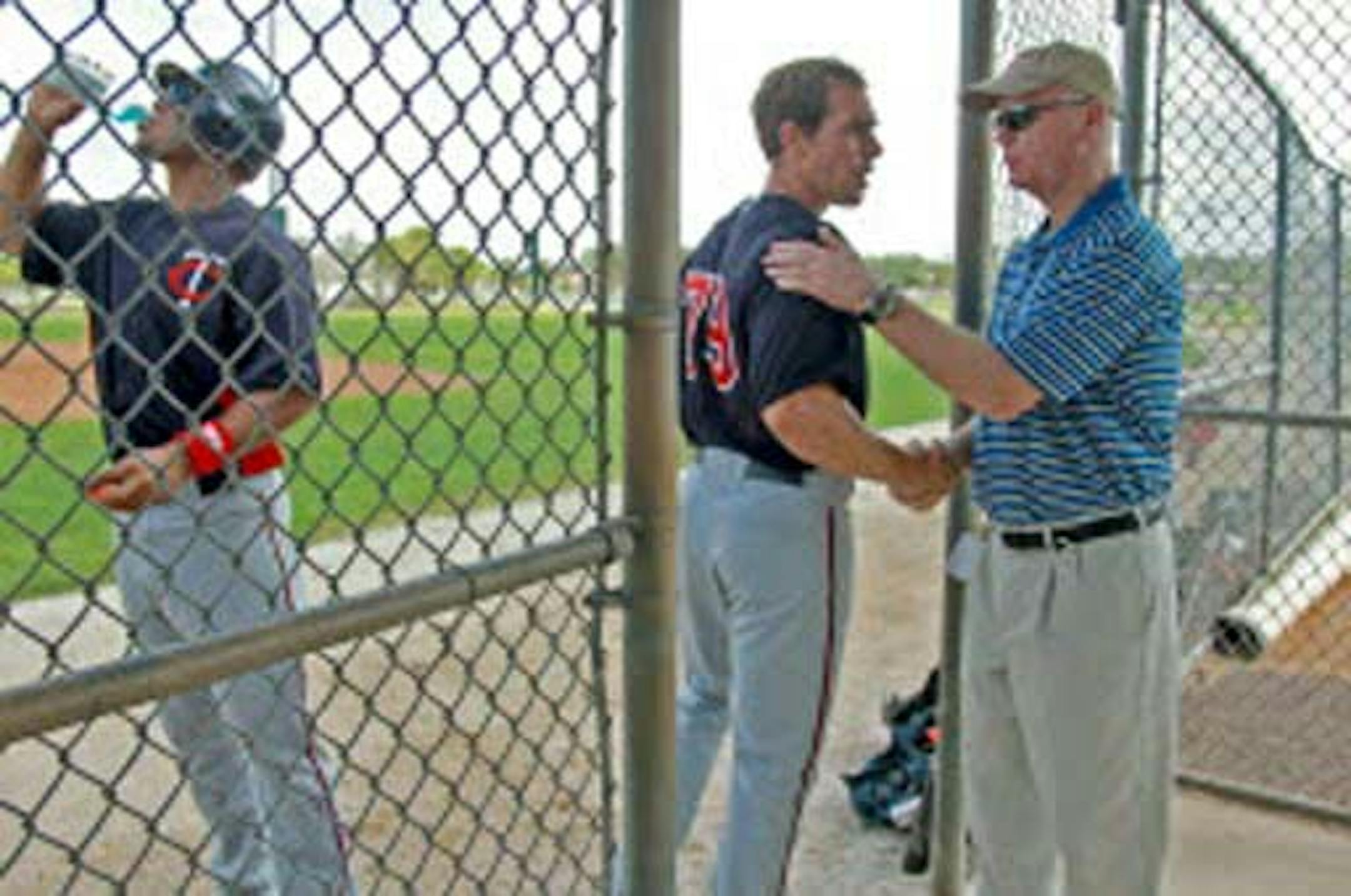 Twins prospect Matt Carson shook hands with Twins General Manager Terry Ryan at spring training. Carson, who appears to be the next Twins call-up from Class AAA Rochester, is batting .277 with 14 homers and 49 RBI in 110 games with the Red Wings.