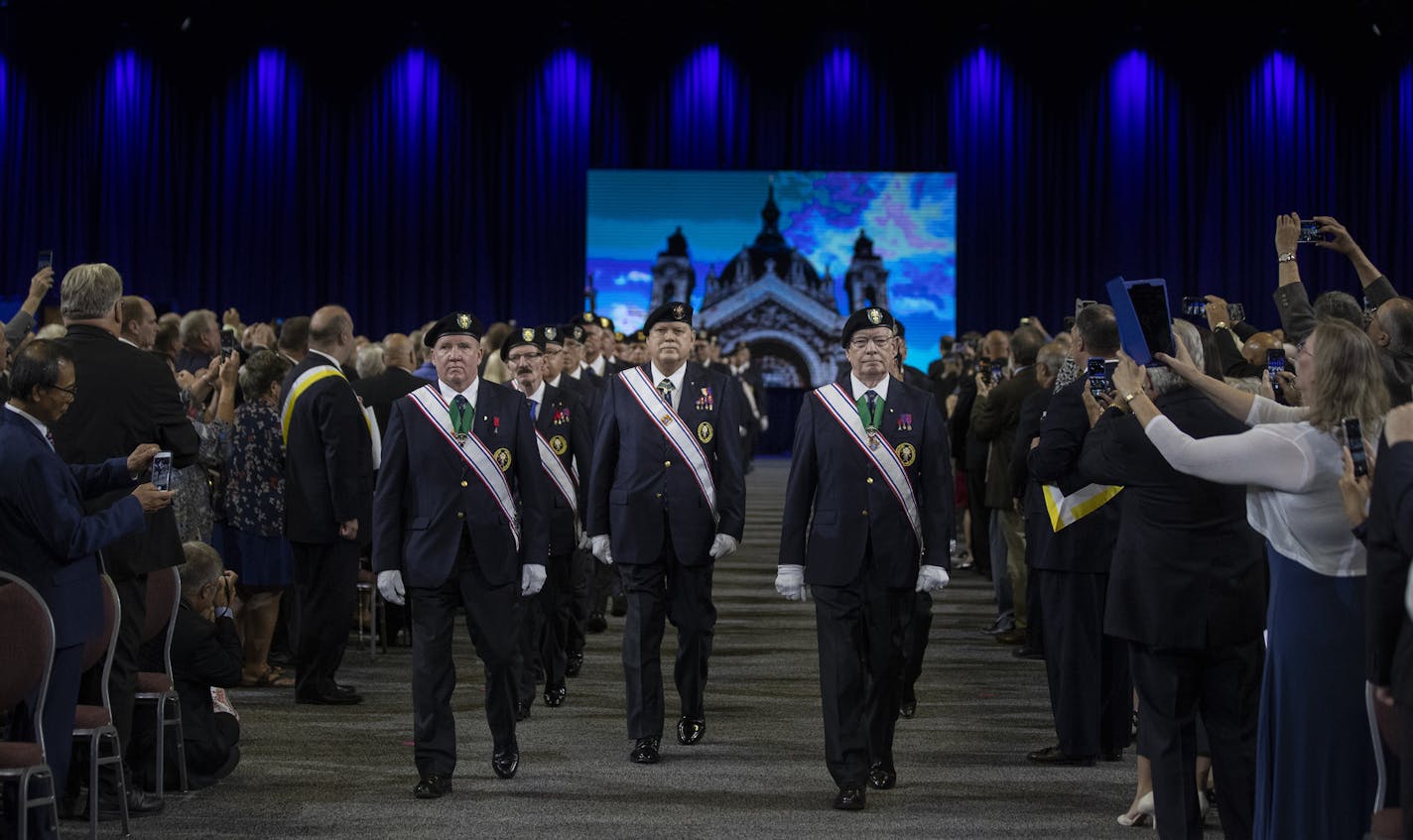 Members of the Knights of Columbus honor guards were among about 3,000 Knights of Columbus who attended the annual convention at the Minneapolis Convention Center Tuesday August 6, 2019 in Minneapolis, MN.] The Knights of Columbus is the world's largest Catholic fraternal service organization, with two million members who last year donated $185 million to charity in nine countries, for causing&#x2019;s ranging Habitat for Humanity to relief for persecuted Christians. Jerry Holt &#x2022; Jerry.ho