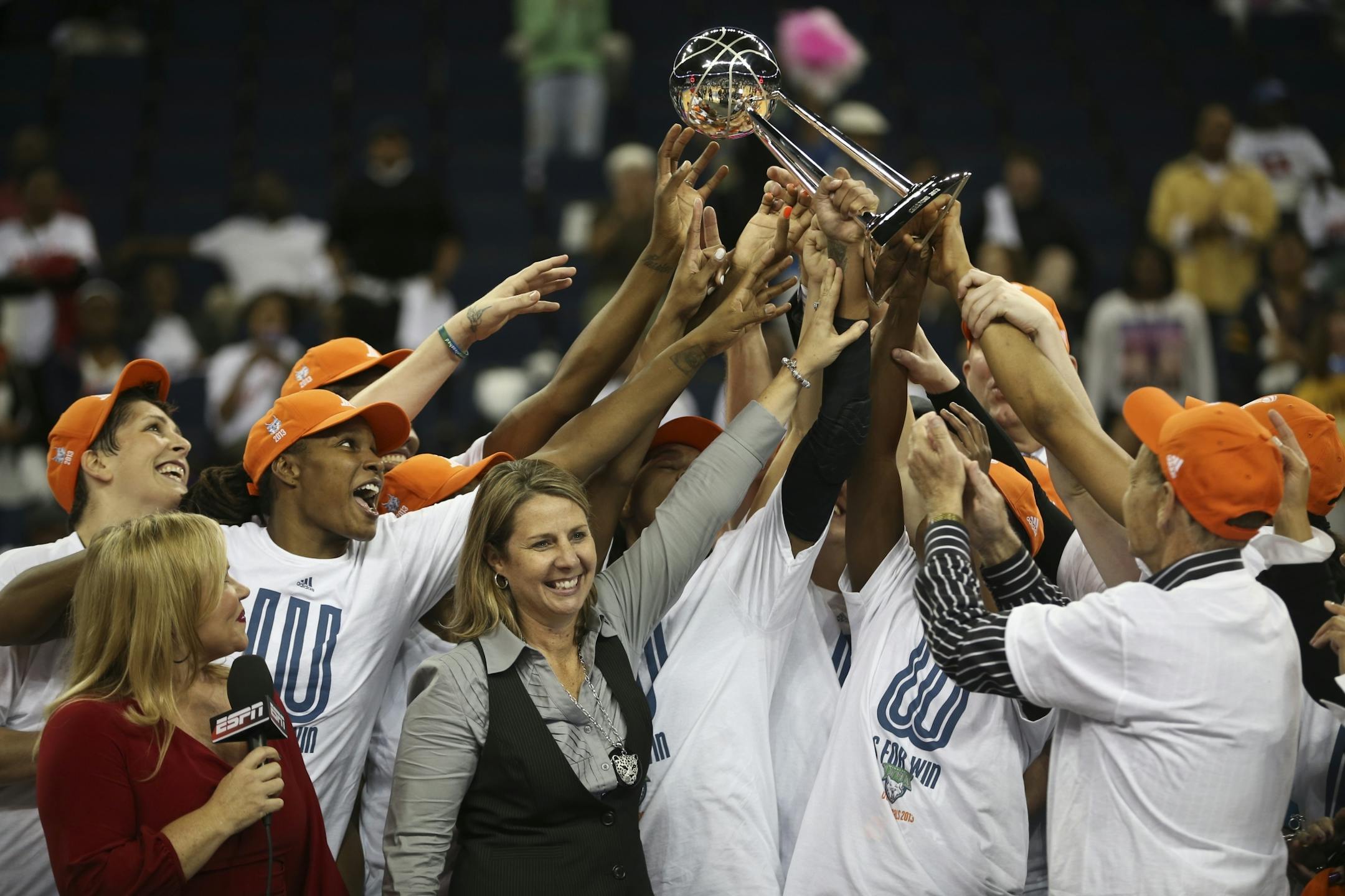 The Minnesota Lynx celebrate their victory over the Atlanta Dream after Game 3 of the WNBA finals on Thursday, October 10, 2013, at the Gwinnett Center in Duluth, Ga. Minnesota won 86-77 to capture the championship.