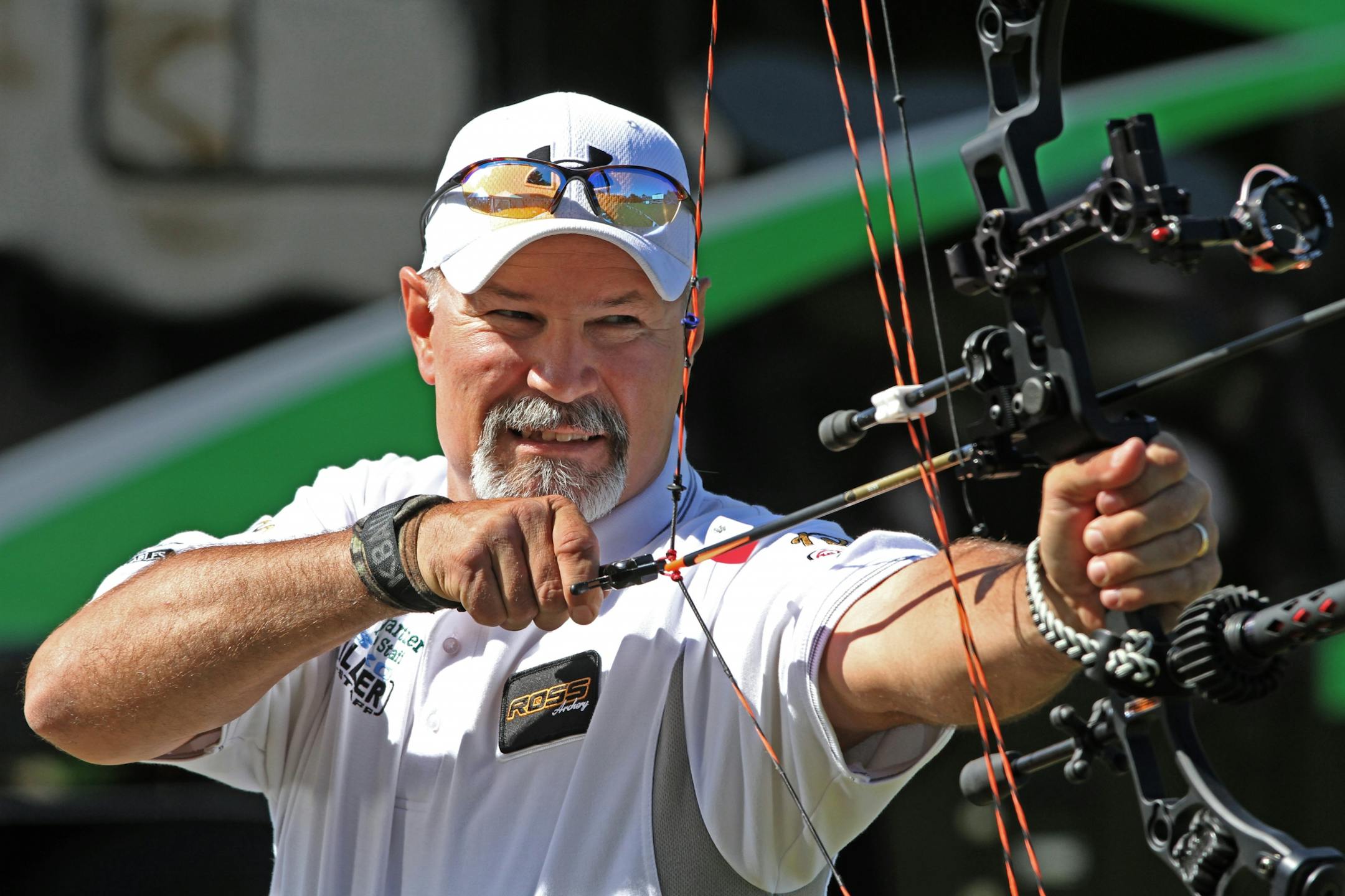 Kurt Baumgartner aimed his Ross H.I.T. bow at the target 100 yards away during the Archery World $1,000 Challenge.