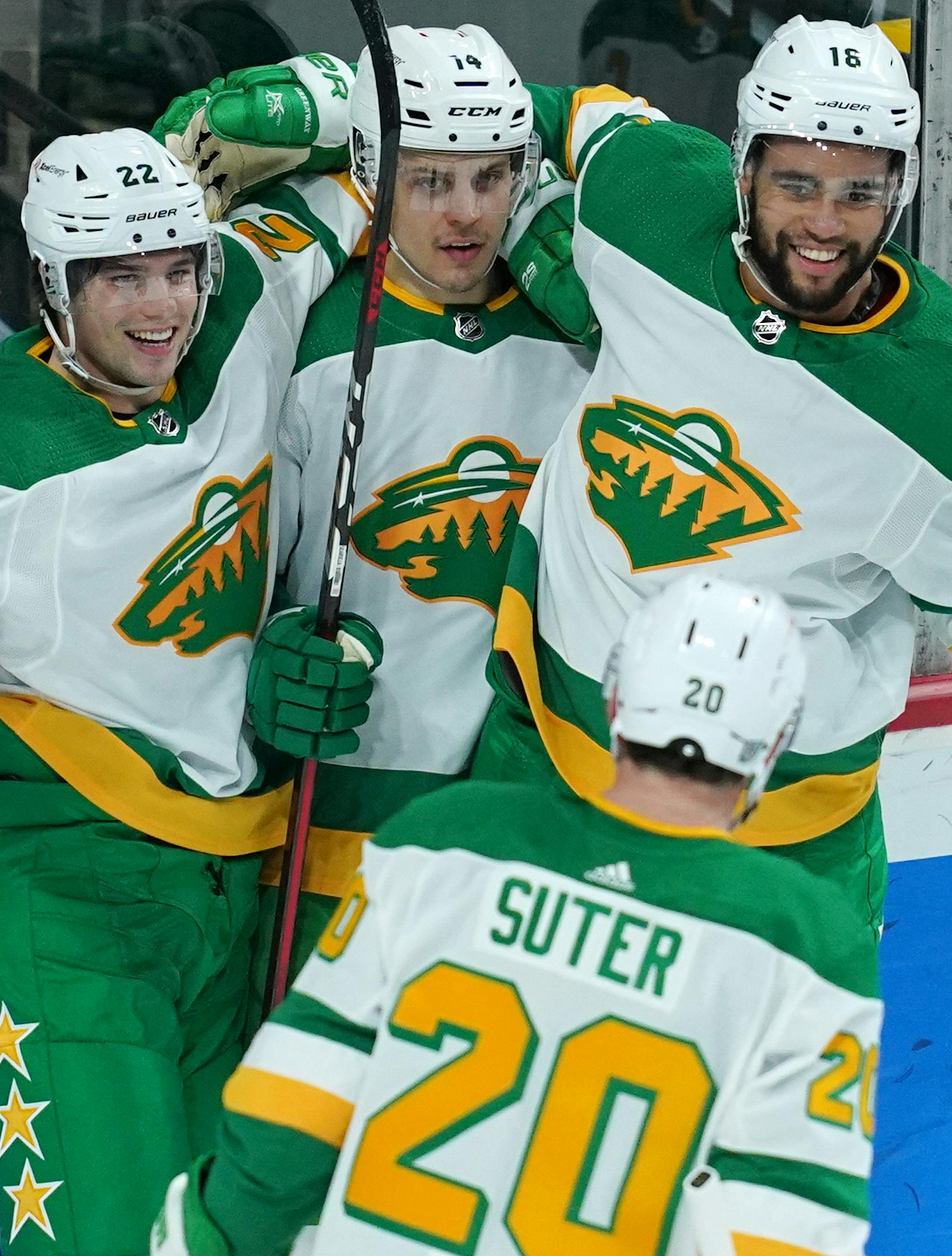 Minnesota Wild center Joel Eriksson Ek celebrated with his teammates after he scored on Los Angeles Kings goaltender Calvin Petersen in the first period.