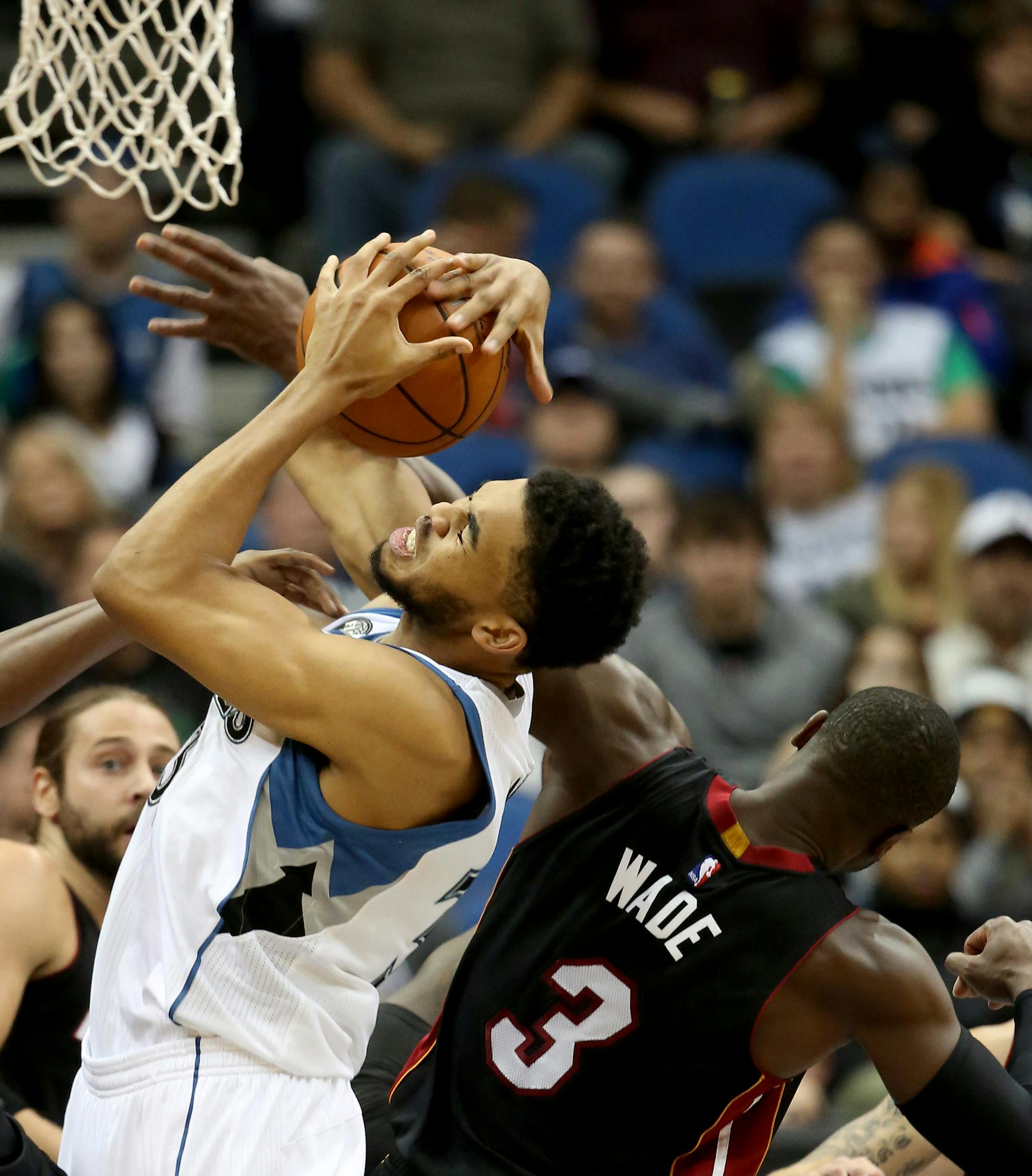 Wolves Karl-Anthony Towns grabbed an offensive rebound during the second half. ] (KYNDELL HARKNESS/STAR TRIBUNE) kyndell.harkness@startribune.com Wolves vs Miami at the Target Center in Minneapolis Min., Thursday November 5, 2015. Miami won over the Wolves 96-84.