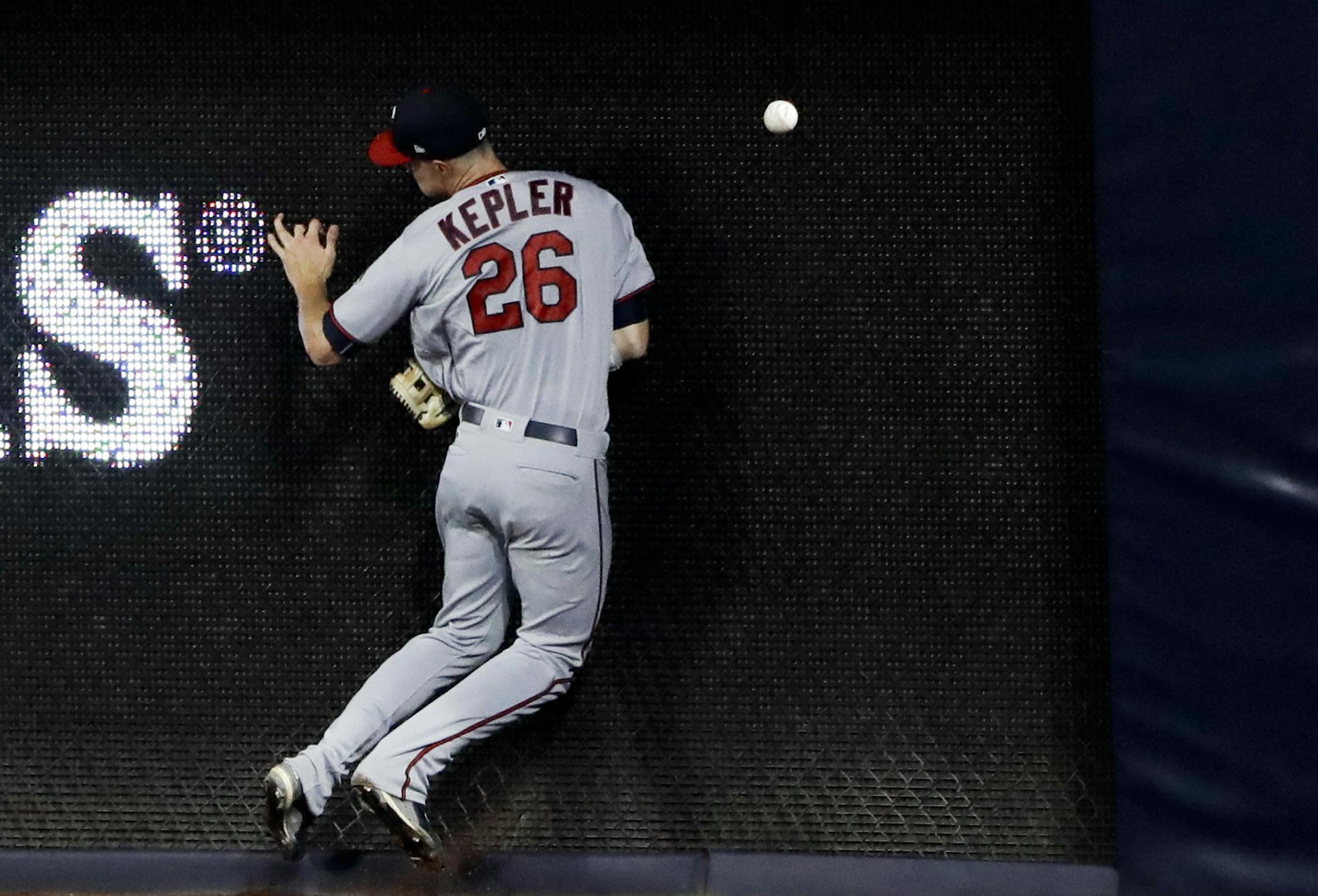 Minnesota Twins right fielder Max Kepler can't reach a hit for a double by the San Diego Padres' Austin Hedges during the sixth inning of a baseball game Tuesday, Aug. 1, 2017, in San Diego. (AP Photo/Gregory Bull)