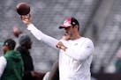 Jets quarterback Aaron Rodgers, shown throwing before a game against the Eagles on Nov. 15, has been cleared to practice — exactly 11 weeks after ha