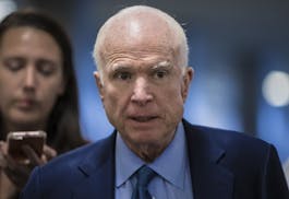 Sen John McCain, R-Ariz., returns to his office after a series of votes at the Capitol in Washington, Thursday, Oct. 19, 2017.