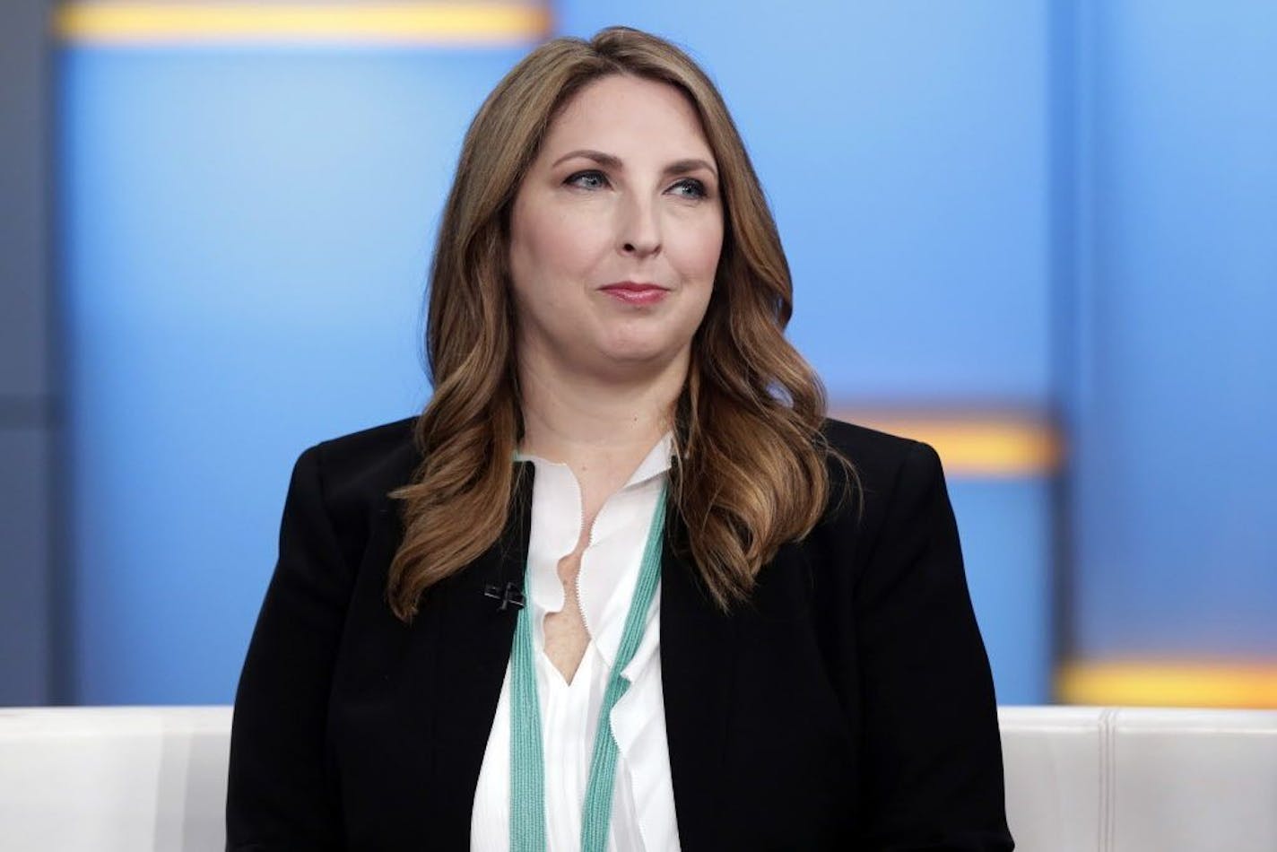 FILE - In this May 24, 2018, file photo, Chair of the Republican National Committee Ronna McDaniel appears on the "Fox & friends" television program in New York. McDaniel is rating her party's chances of retaining control of the House at "50-50." McDaniel cautioned that Democrats will seek to make the November midterm elections about President Donald Trump and "personality", but it's the results that matter.