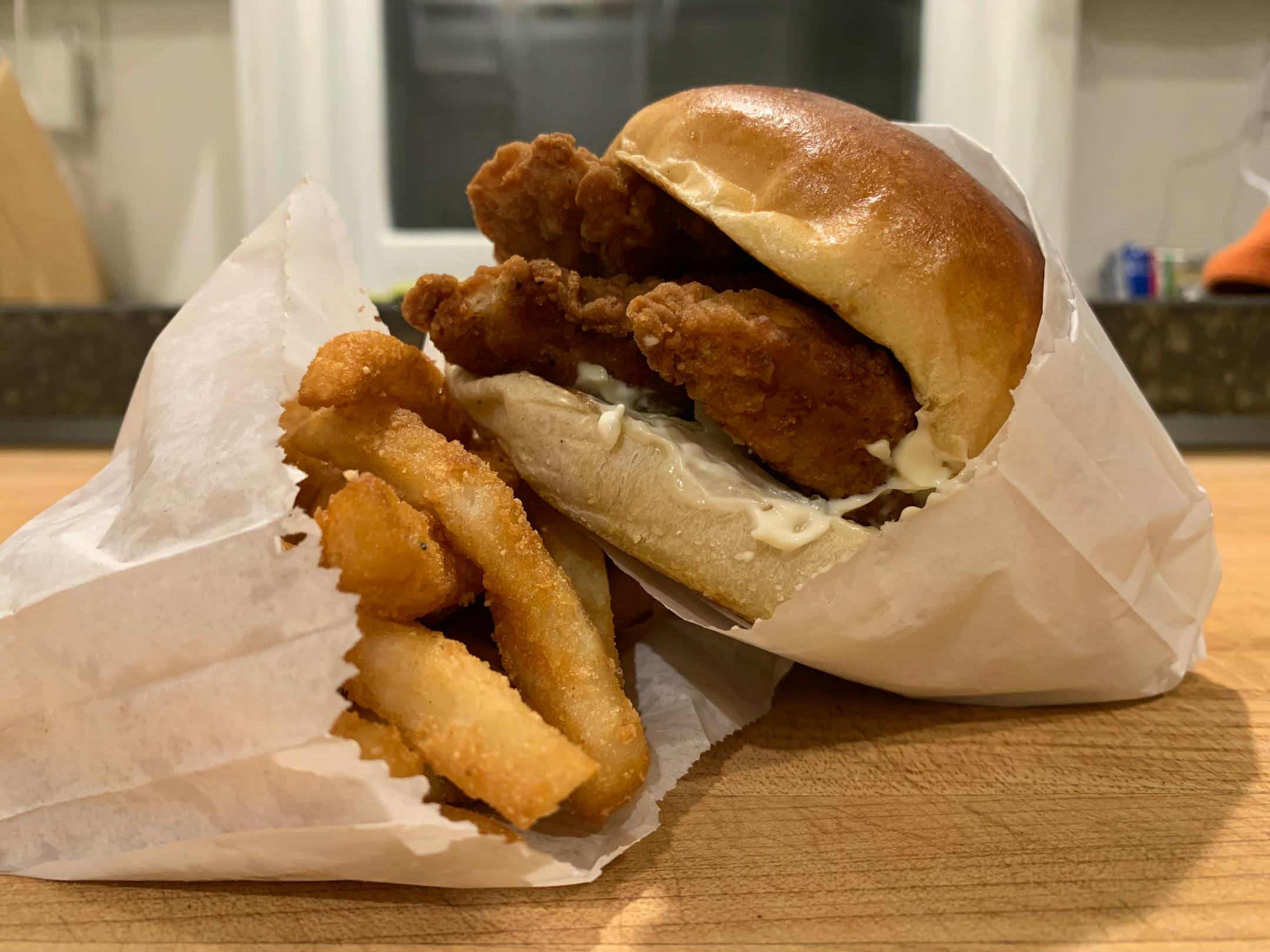 Chicken sandwich and fries from Burger Press in Edina.