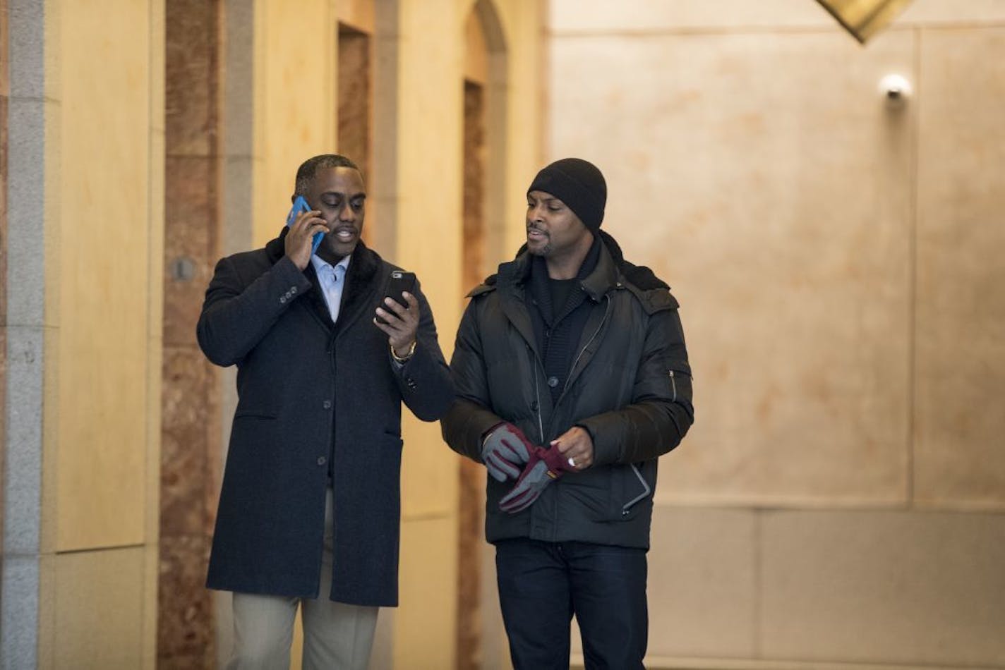 Lawyer Lee Hutton spoke with Antoine Winfield Sr. downtown Minneapolis where a large group of Gopher players met Friday morning, December 16, 2016, in Minneapolis, Minn.