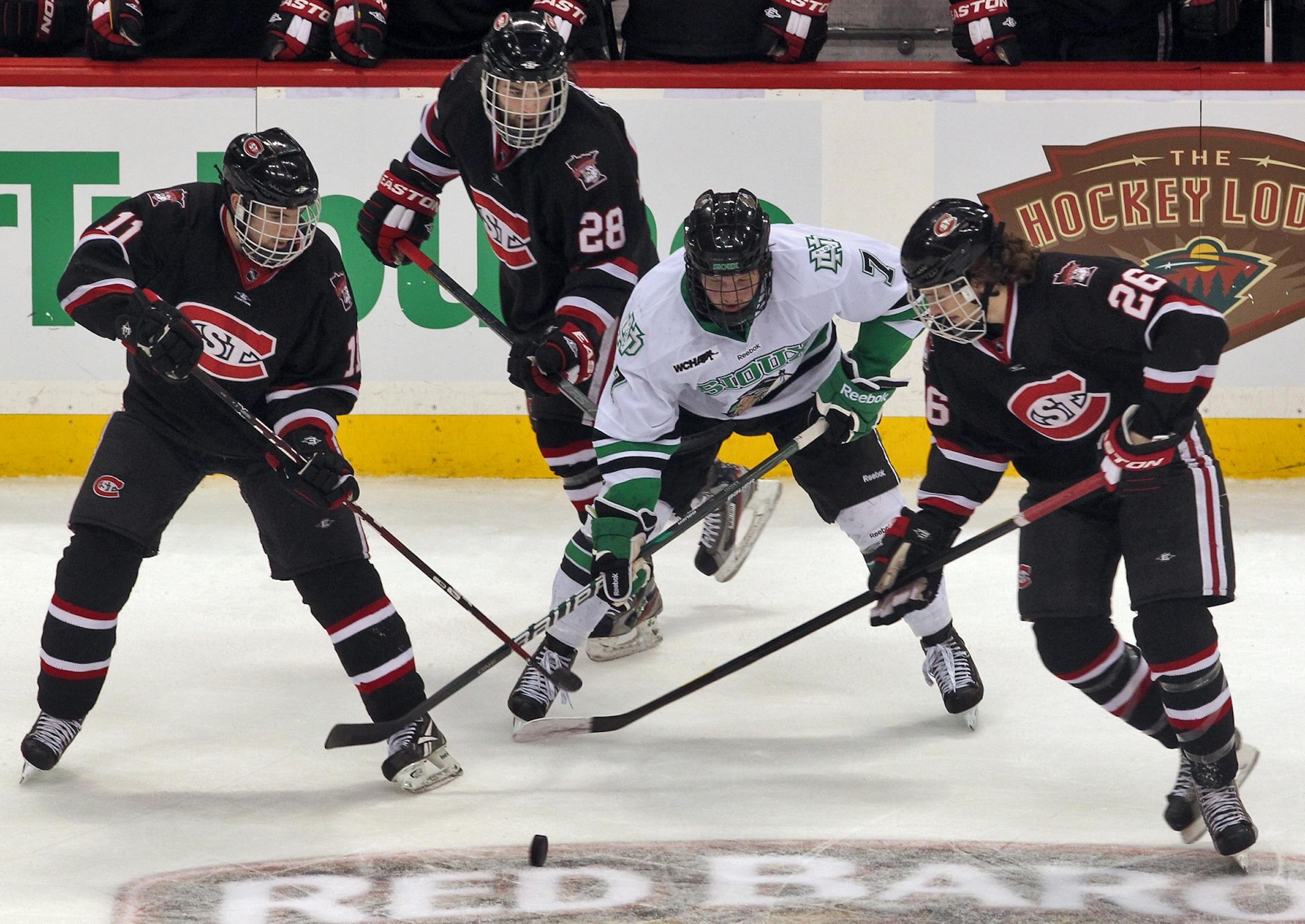 North Dakota's assistant captain Danny Kristo (middle) against St. Cloud State last season.