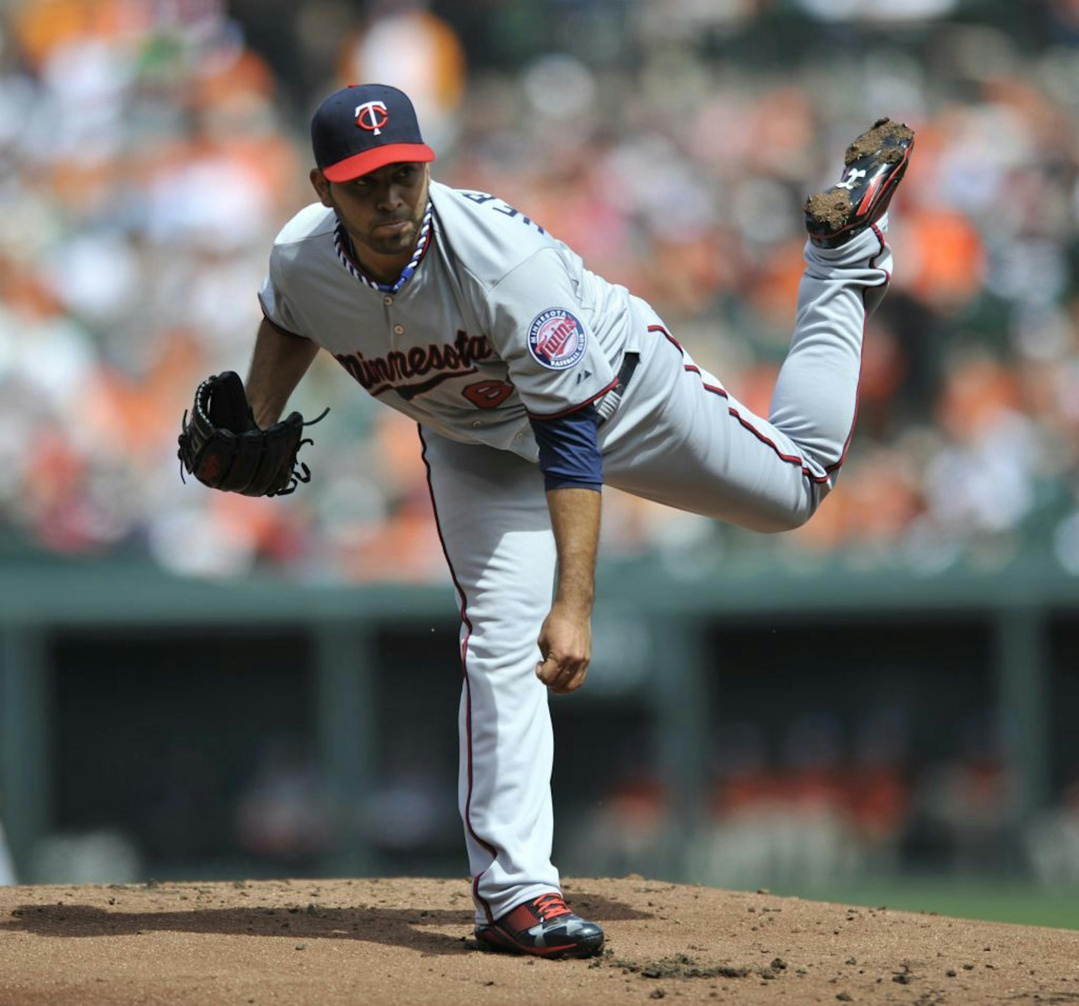 Minnesota Twins starting pitcher Pedro Hernandez throws against the Baltimore Orioles in the first inning of a baseball game on Sunday, April 7, 2013, in Baltimore.