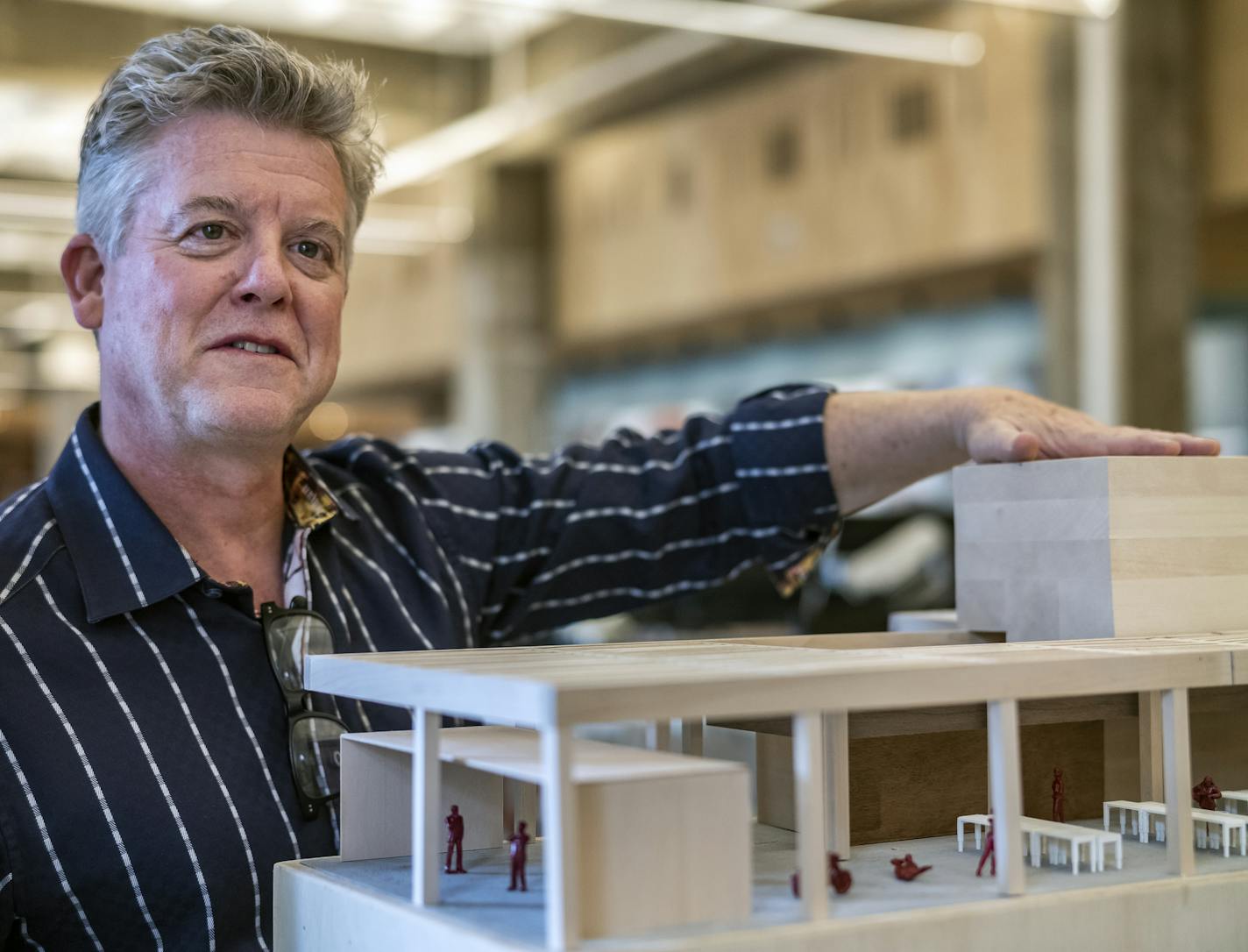 Architect Bill Baxley gives a tour Gensler's new office space, here in model form, which will serve as a sort of demonstration project for prospective clients.] RICHARD TSONG-TAATARII &#xa5; richard.tsong-taatarii@startribune.com