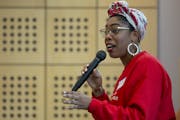 Me'Lea Connelly, who founded a credit union to invest in black businesses, led a discussion regarding black economic resistance to a group at the Unit
