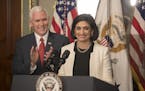 Seema Verma, the new administrator of the Centers for Medicare and Medicaid Services, is shown with Vice President Mike Pence after being sworn in Tue