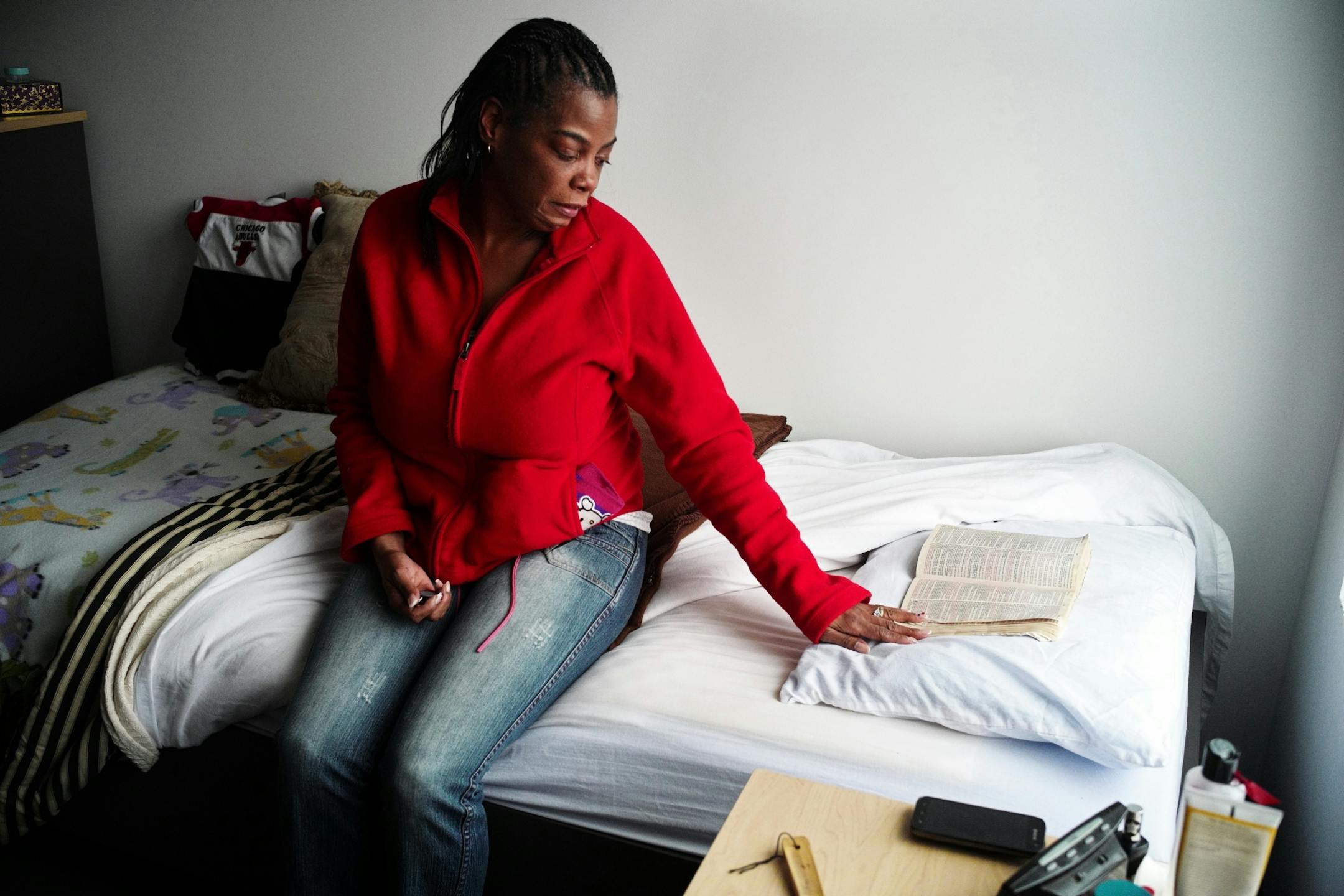 Camille Mitchell-Pasha lost her job and apartment as a result of seizures. "It's a blessing because I had nothing." She reads the Bible regularly, including Psalms which comfort her.