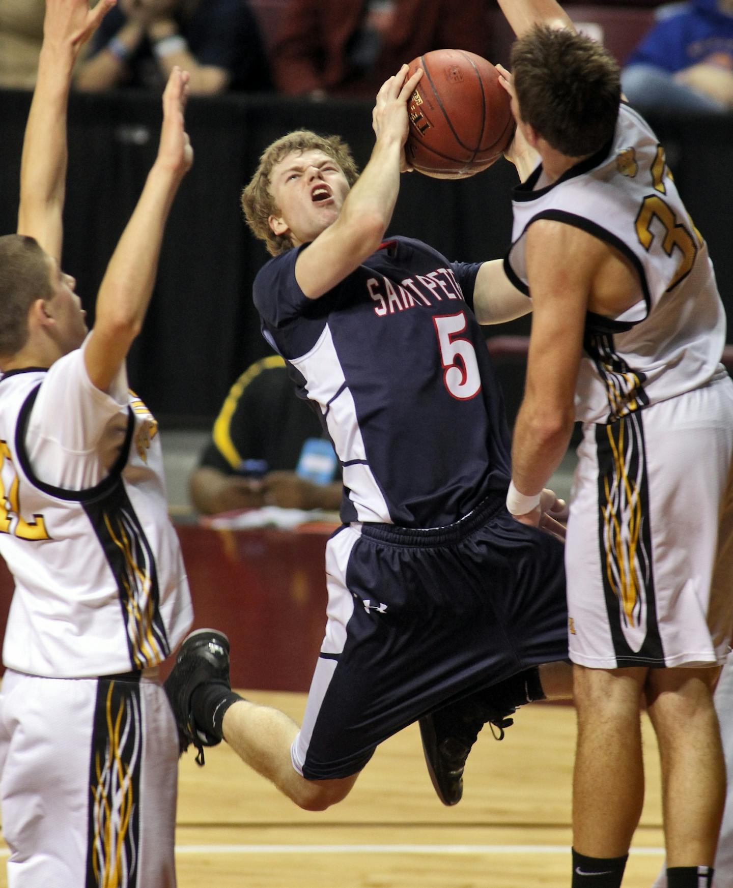 St. Peter's Pace Maier headed to the basket against Plainview-Elgin-Millville.