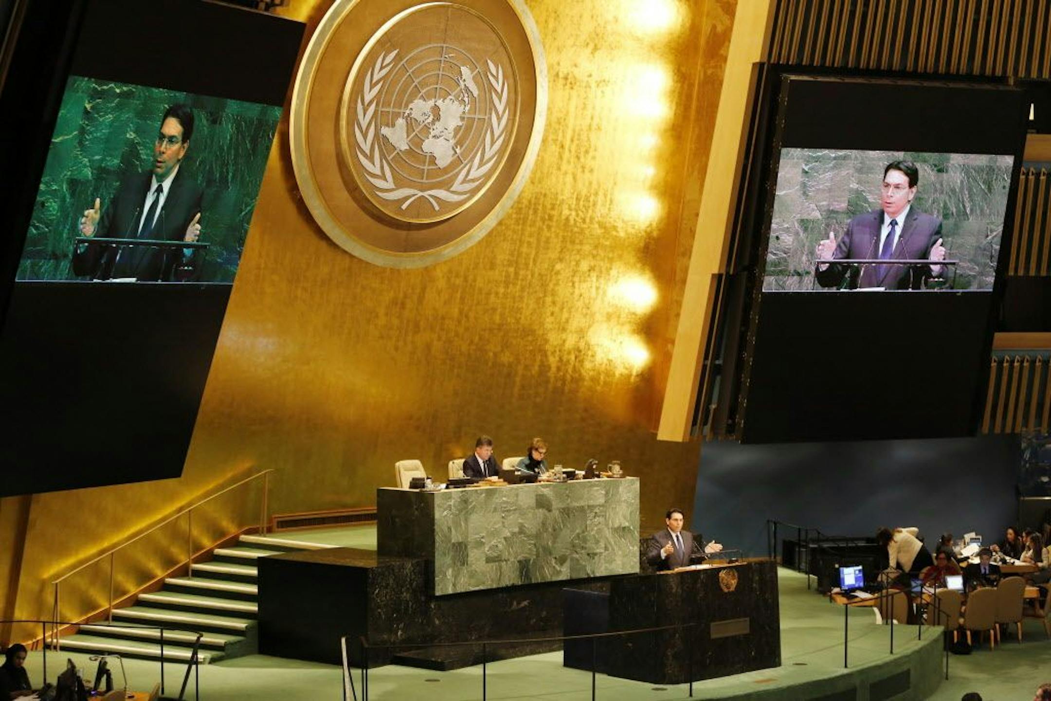 Danny Danon, Israel's ambassador to the U.N., speaks at the General Assembly, Thursday, Dec. 21, 2017, at United Nations headquarters. President Donald Trump's threat to cut off U.S. funding to countries that oppose his decision to recognize Jerusalem as Israel's capital has raised the stakes in Thursday's U.N. vote and sparked criticism of his tactics, with one Muslim group calling it bullying or blackmail.
