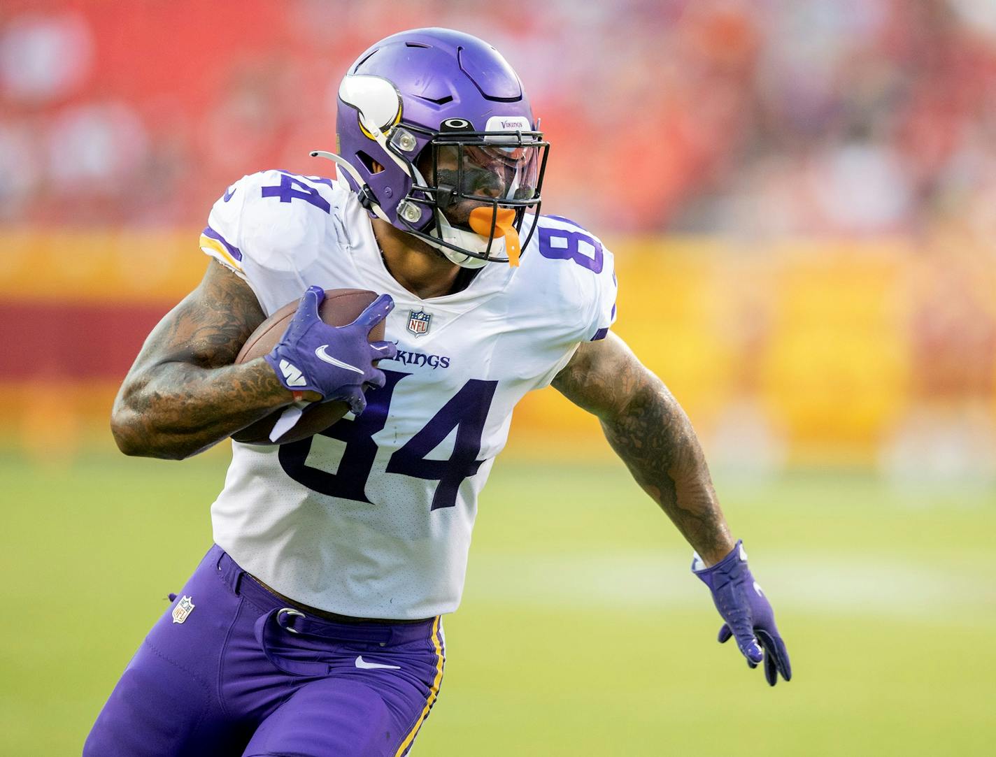 Vikings' tight end Irv Smith (84) ran for a first down in the first quarter at GEHA Field at Arrowhead Stadium, Friday, August 27, 2021 in Kansas City, MO. ] ELIZABETH FLORES • liz.flores@startribune.com