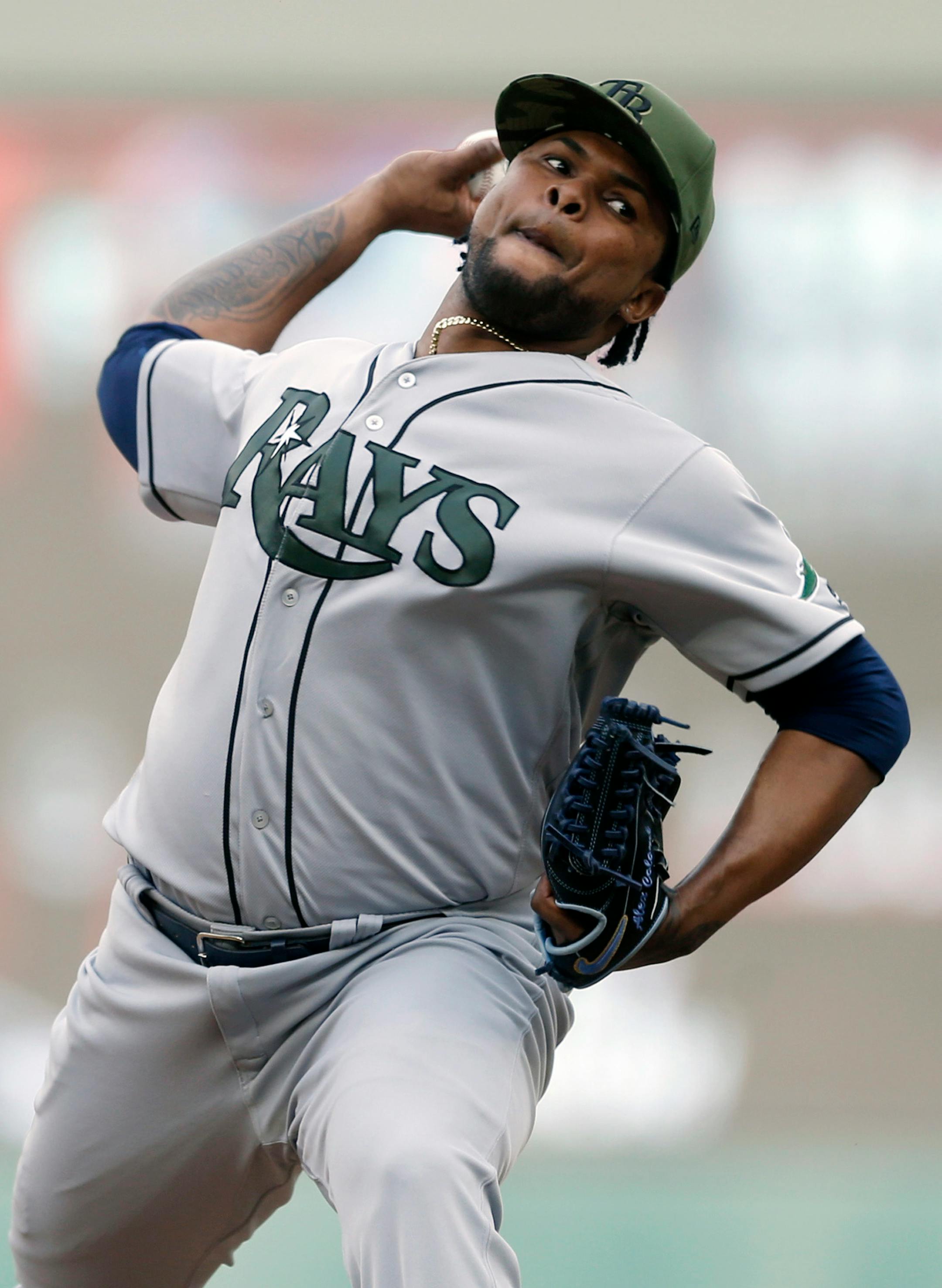 Tampa Bay Rays pitcher Alex Colome throws against the Minnesota Twins in the 13th inning of a baseball game Sunday, May 28, 2017 in Minneapolis. Colome picked up the win. (AP Photo/Jim Mone)