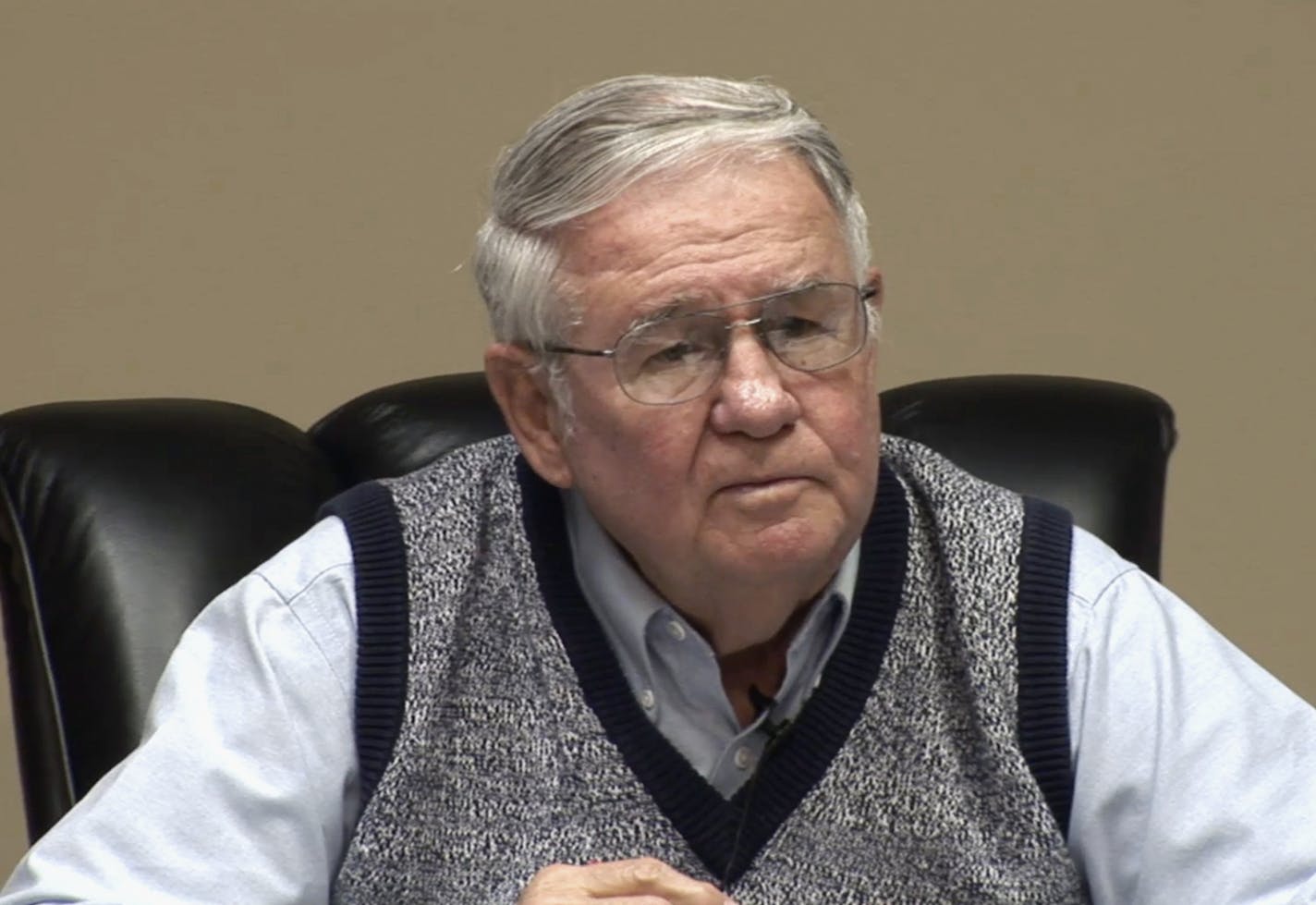 This May 16, 2014 photo from a video deposition provided by Jeff Anderson & Associates, shows former priest Thomas Adamson, who is at the center of a lawsuit against the St. Paul-Minneapolis archdiocese. Adamson said under oath that he sexually abused 12 teens as he was moved from one parish to another from the 1960s to the mid-1980s.