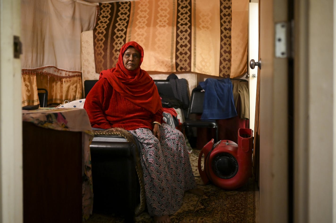 Nadifo Yusuf Ismail, 70, lives on the 13th floor of the high rise at 630 Cedar Av. She says she tried to escape but couldn't so she locked herself in her apartment. "My eyes are full of smoke and I can't breath well and I can't see well," her voice breaking and hoarse. She was sitting on her bed beside an industrial fan placed in her apartment to help dry it out and rid it of the scent of smoke.