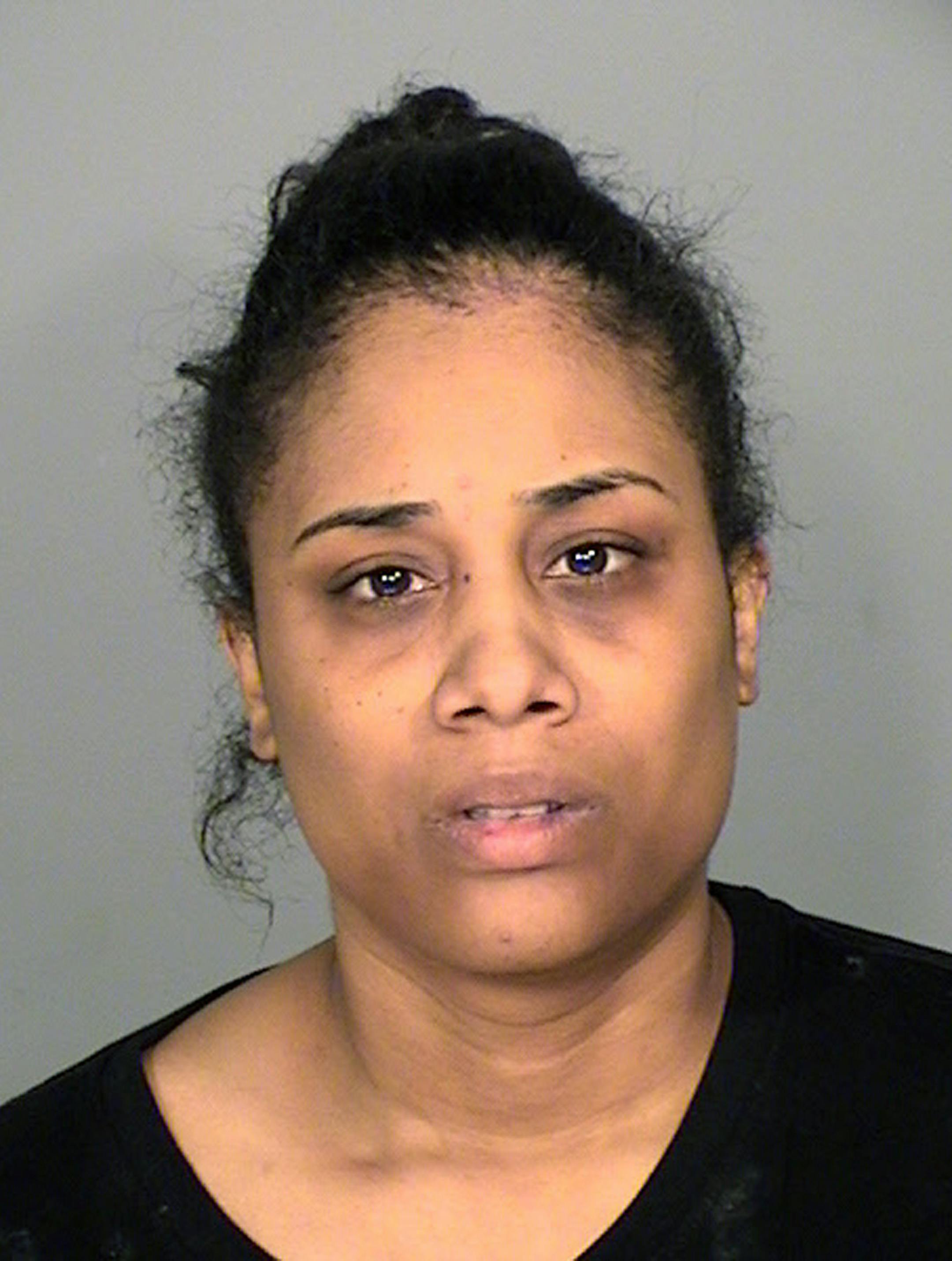 This March 2020 booking photo provided by the Ramsey County Sheriff's Office shows Itayvia Lloyd. Lloyd, of Minnesota, is accused of yanking her 11-year-old son from bed and throwing him off their apartment's fourth floor balcony, leaving him with traumatic injuries, police said Monday, March 9, 2020. (Ramsey County Sheriff's Office via AP)