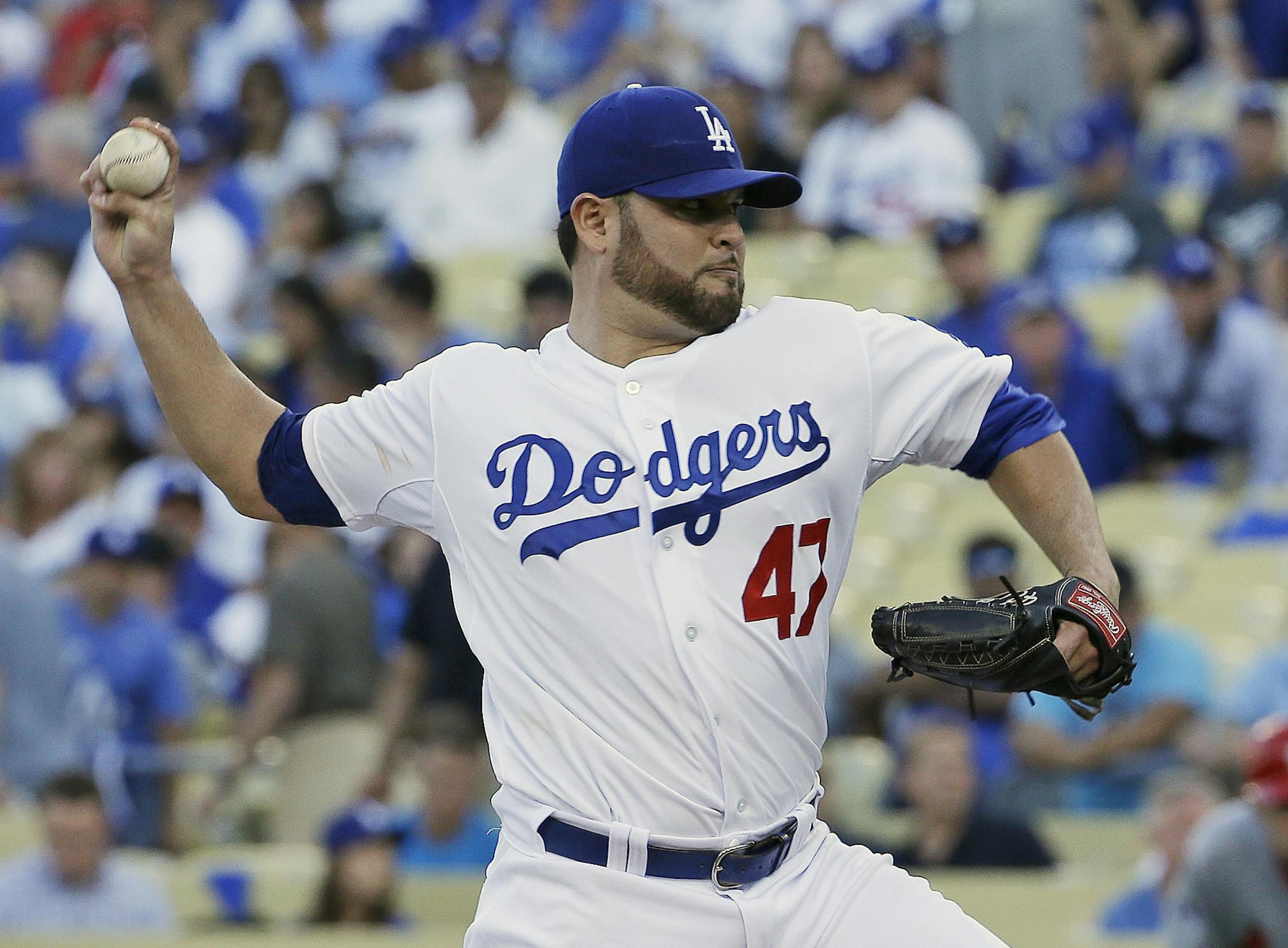Los Angeles Dodgers starting pitcher Ricky Nolasco throws during the first inning of Game 4 of the National League baseball championship series against the St. Louis Cardinals Tuesday, Oct. 15, 2013, in Los Angeles. (AP Photo/David J. Phillip)