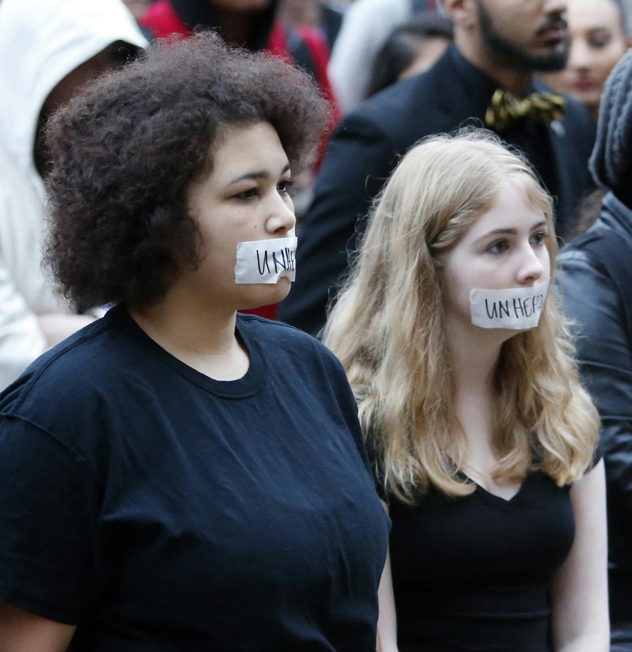 Students at the University of Oklahoma protest racist comments made by a fraternity on Monday, March 9, 2015 in Norman, Okla. University President David Boren lambasted members of Sigma Alpha Epsilon fraternity on Monday who participated in a racist chant caught on video, calling them disgraceful and their behavior reprehensible, and ordered that their house be vacated by midnight Tuesday. (AP Photo/The Oklahoman, Steve Sisney) ORG XMIT: MIN2015031011132129