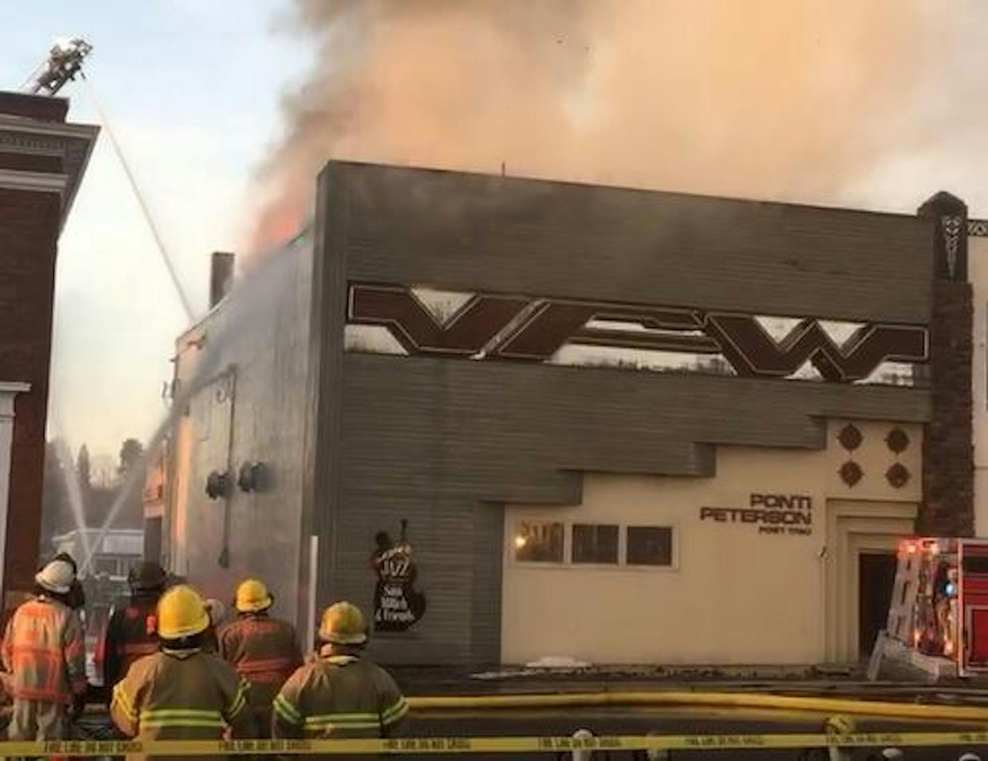 Firefighters were on the scene of a blaze that destroyed the VFW post in Grand Rapids and an addiction treatment center. Credit: Photo by Hugh Quinn