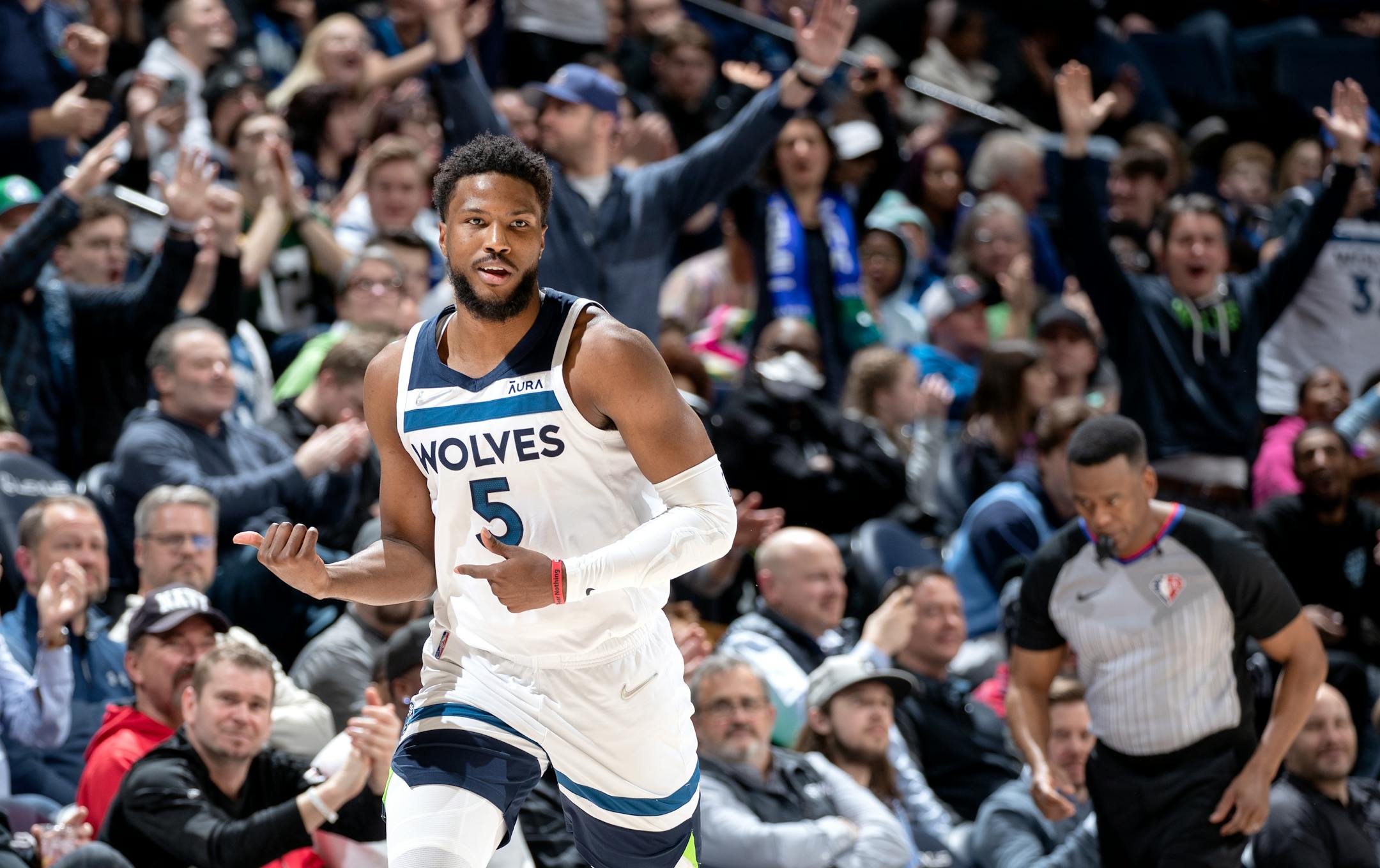Malik Beasley (5) of the Minnesota Timberwolves celebrates after making a three point shot in the fourth quarter.