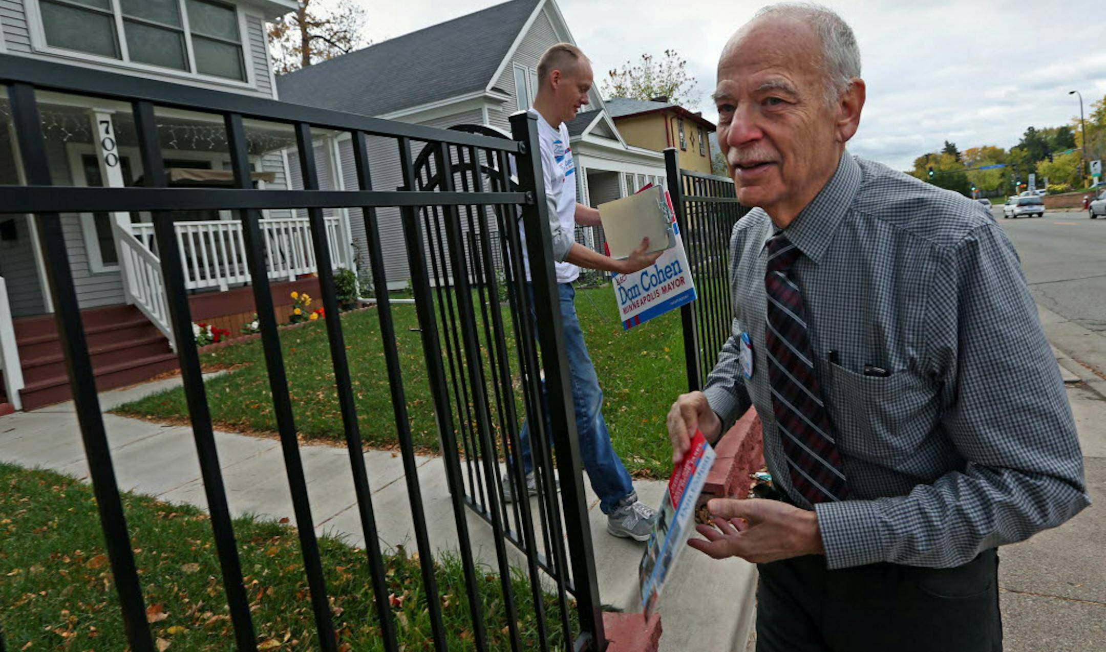 Volunteer Dan Albertson, left, and mayoral candidate Dan Cohen made house calls in north Minneapolis.