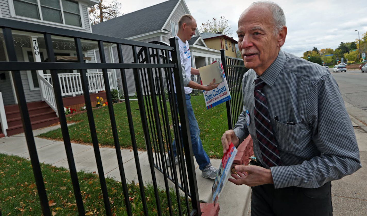 Volunteer Dan Albertson, left, and mayoral candidate Dan Cohen made house calls in north Minneapolis.