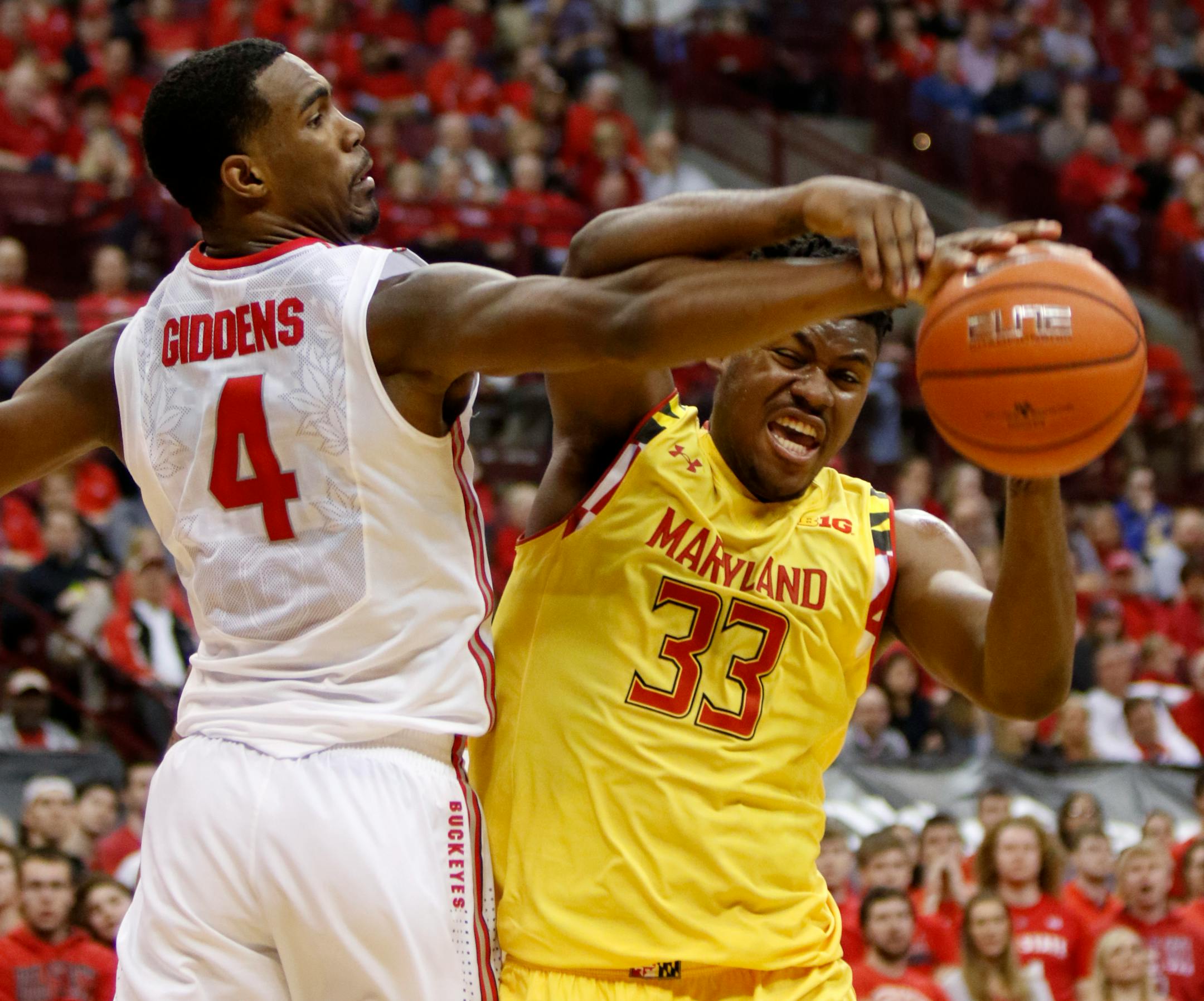 Maryland freshman Diamond Stone, right, was suspended for one game by the team after committing an ugly flagrant foul against Wisconsin forward Vitto Brown in the Terrapins' 70-57 loss on Saturday.