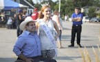 In this Aug. 2, 2018, photo, Democratic governor candidate Billie Sutton, left, poses for a photo with Carrie Wintle during a campaign stop in Madison