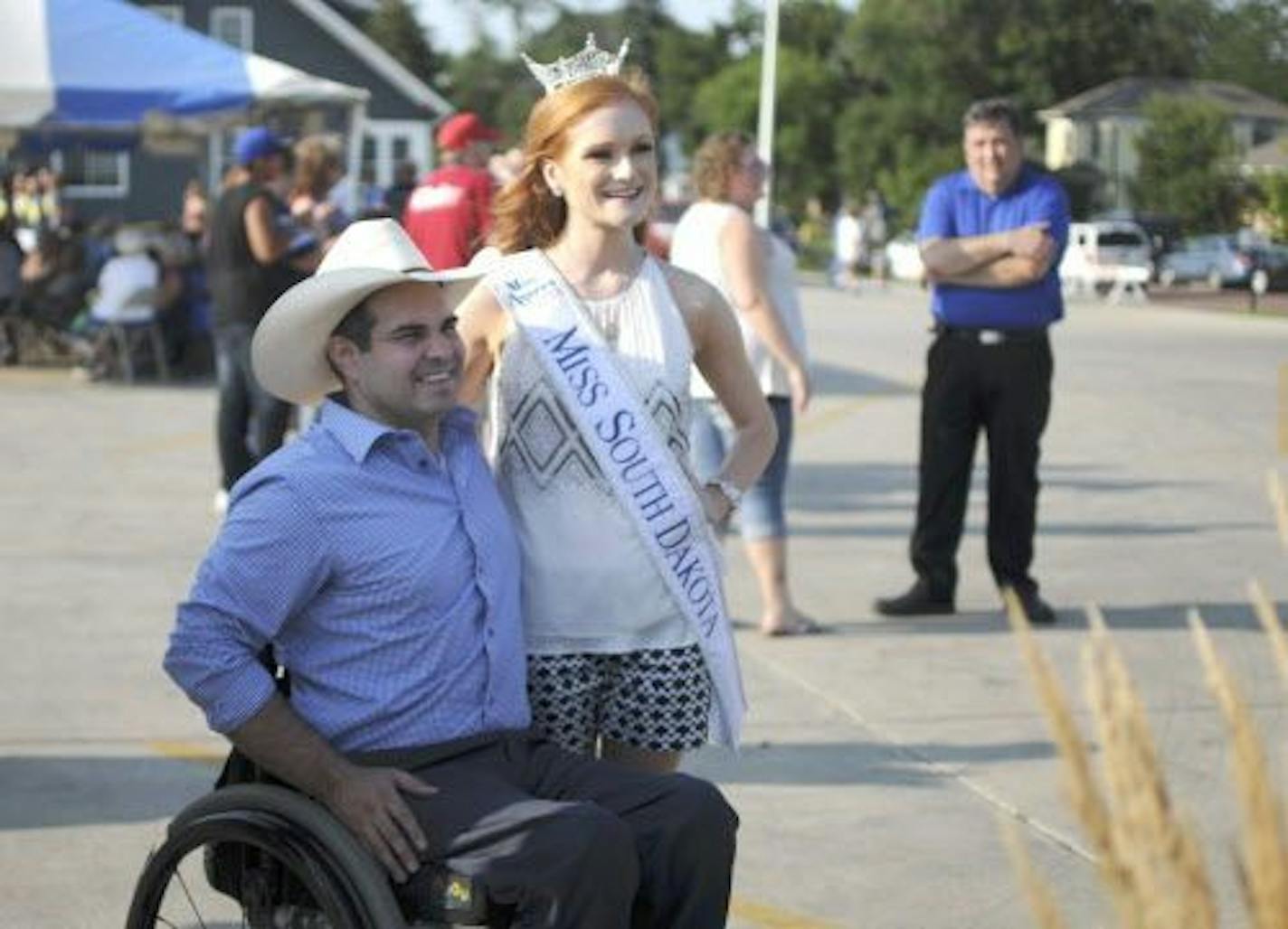 In this Aug. 2, 2018, photo, Democratic governor candidate Billie Sutton, left, poses for a photo with Carrie Wintle during a campaign stop in Madison, S.D. Sutton is seeking to be the first Democrat elected South Dakota governor in more than four decades.