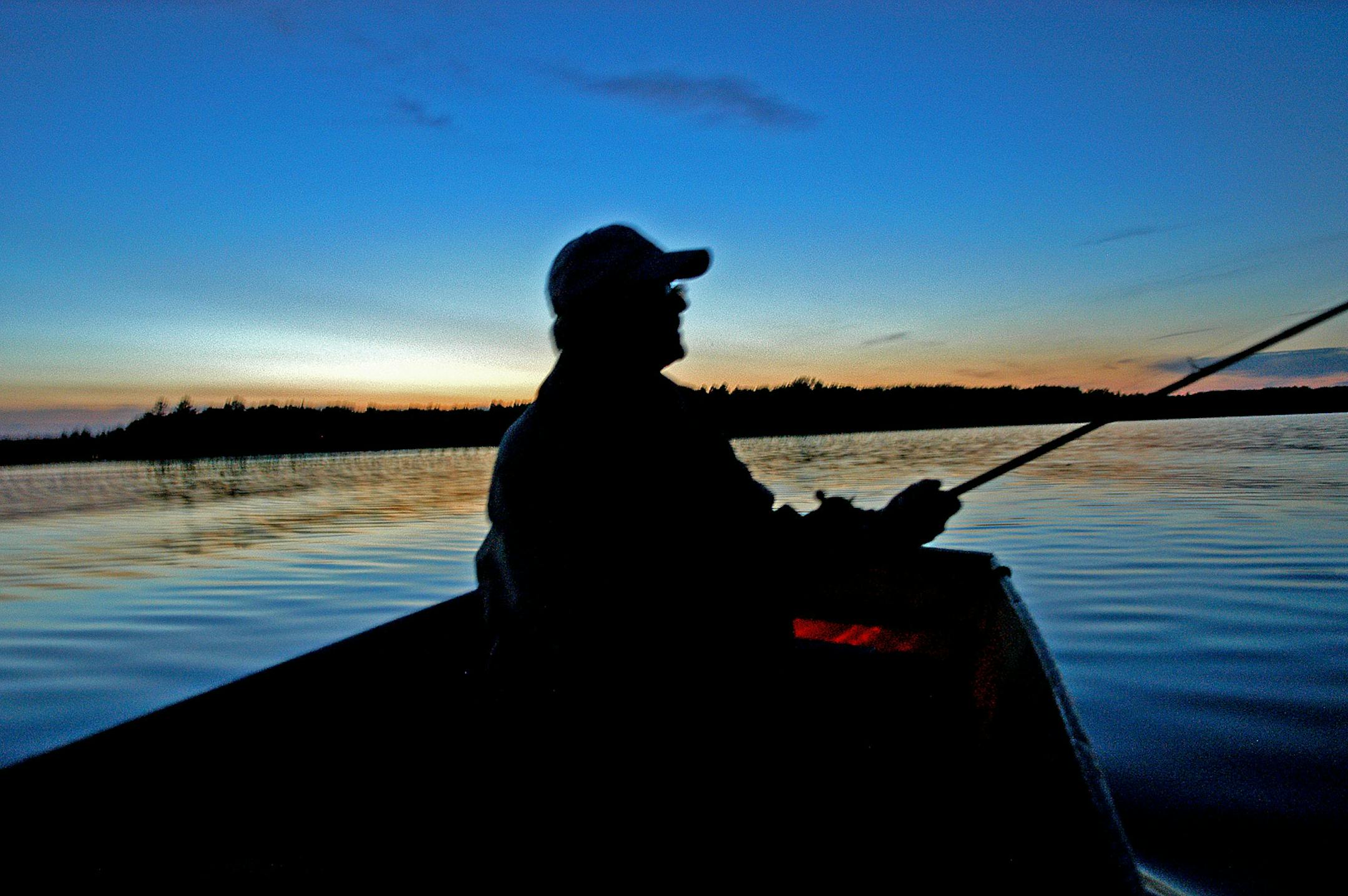Minnesota native and Oregon transplant Bob Netko passes a late summer's night dreaming of, and trolling for, muskies in the bow of a 14-foot john boat.