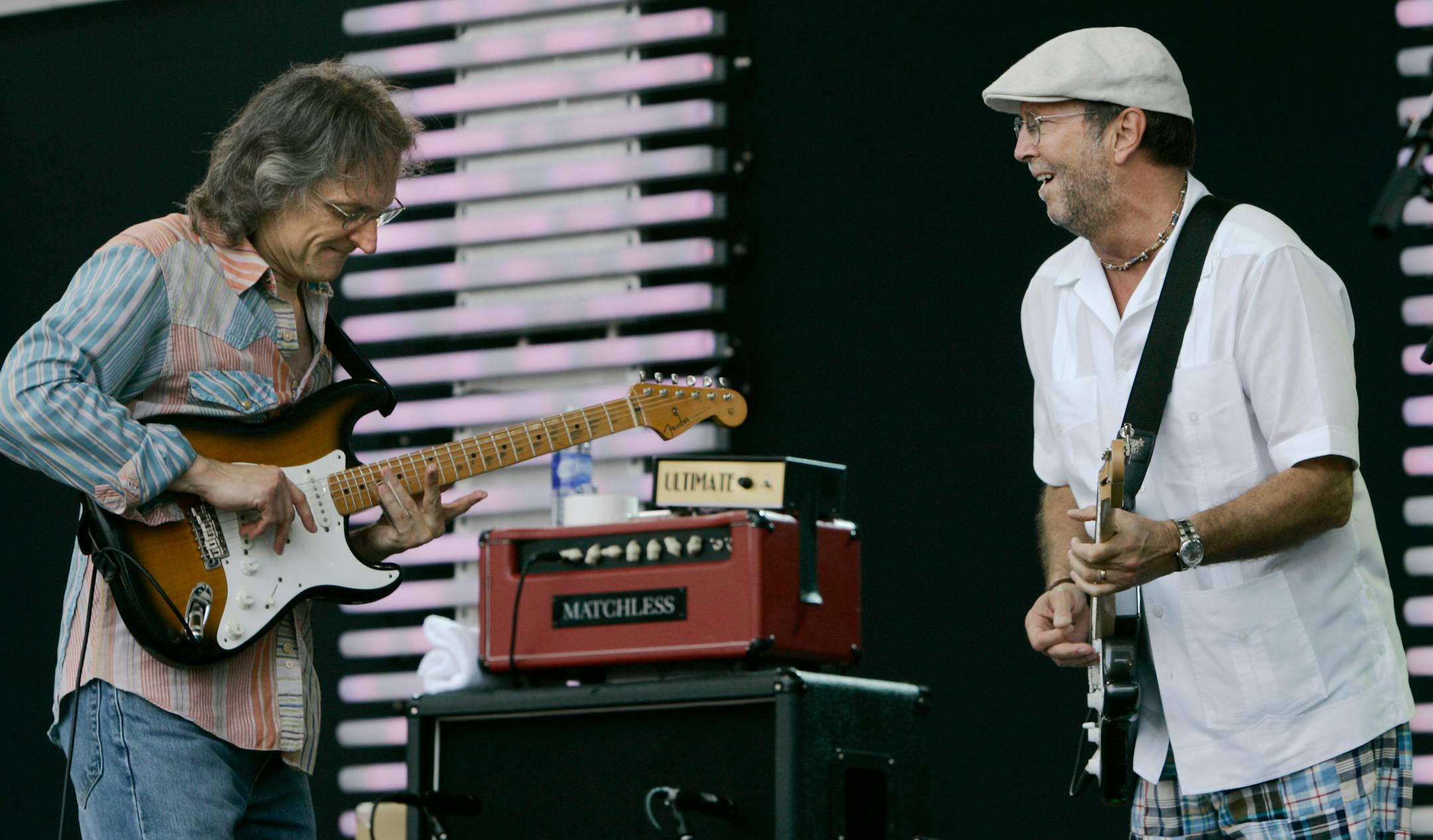 Eric Clapton, right, performs with Sonny Landreth, left, at the Crossroads Guitar Festival in Chicago, Saturday, July 28, 2007.